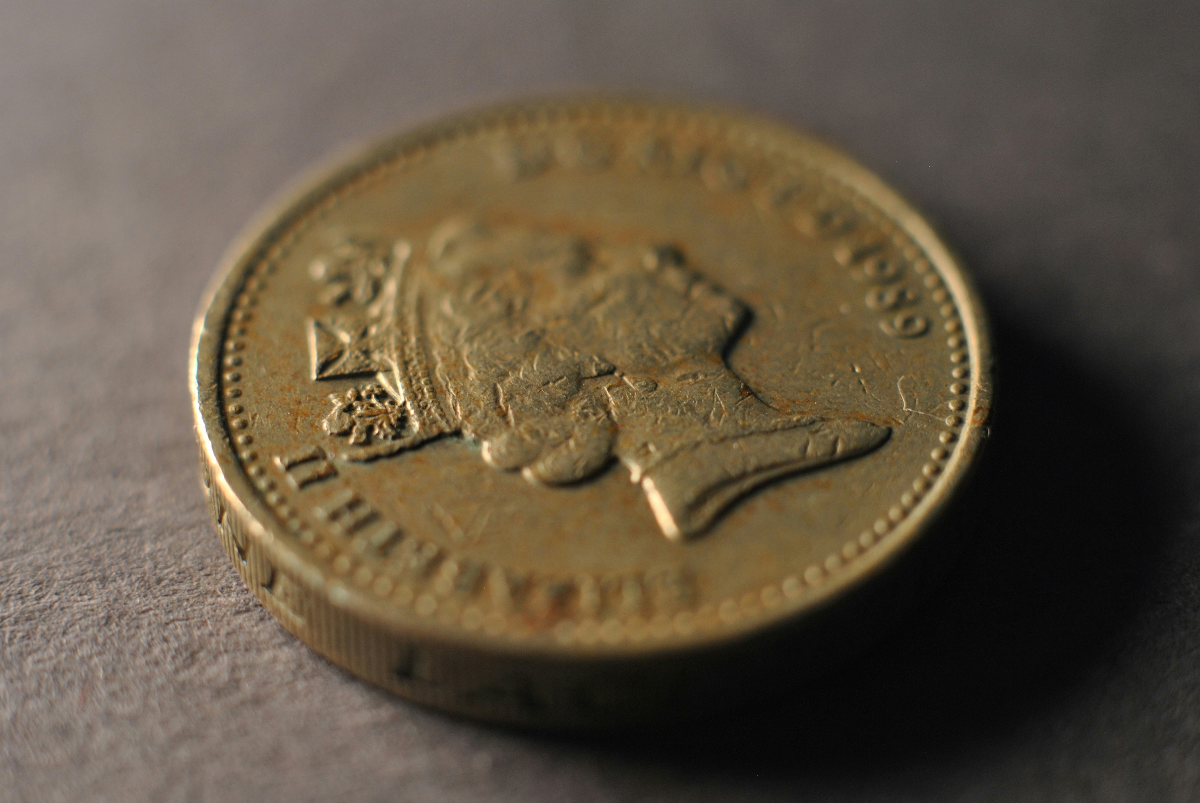 A close up of a coin on a table