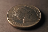 A close up of a coin on a table