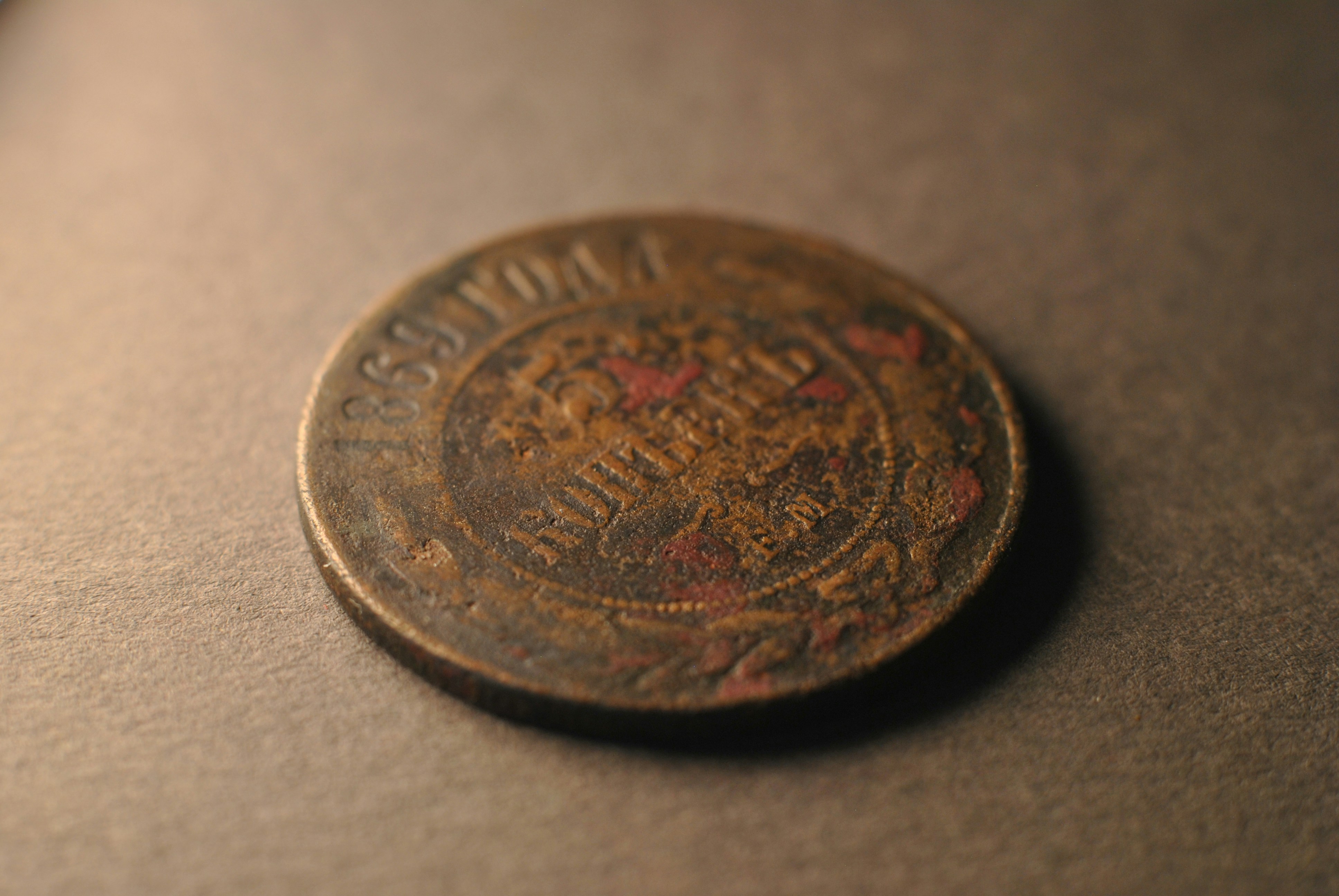 A coin sitting on top of a table