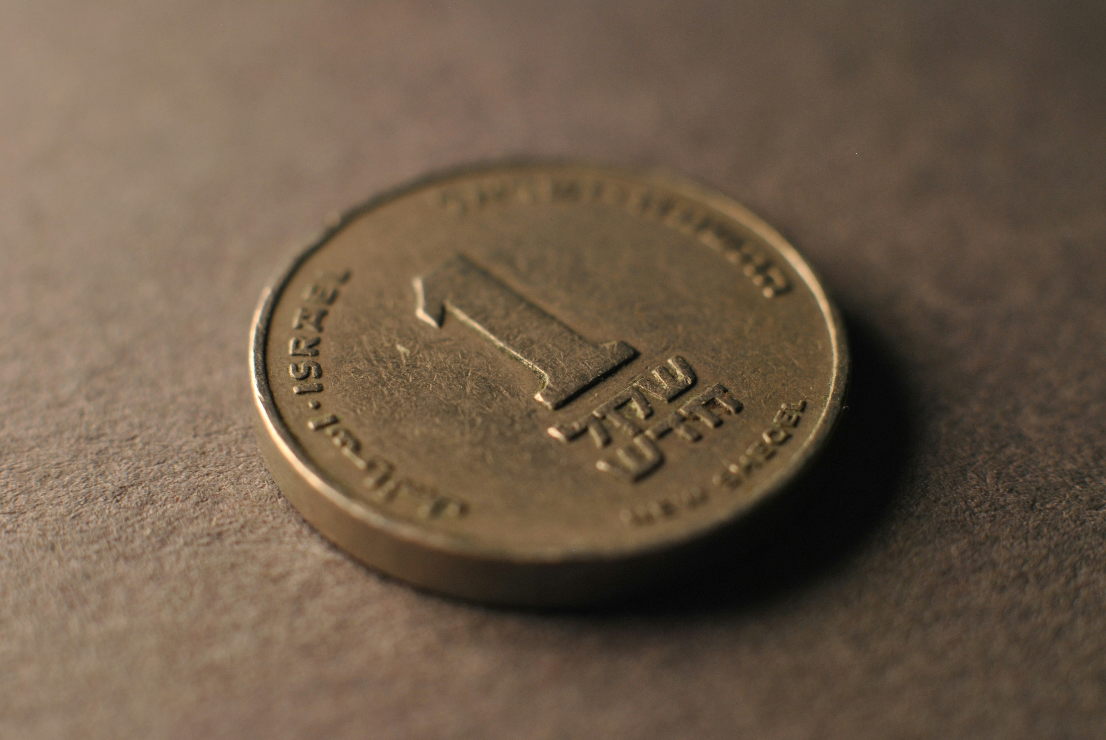 A close up of a coin on a table