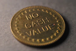 A close up of a coin on a table