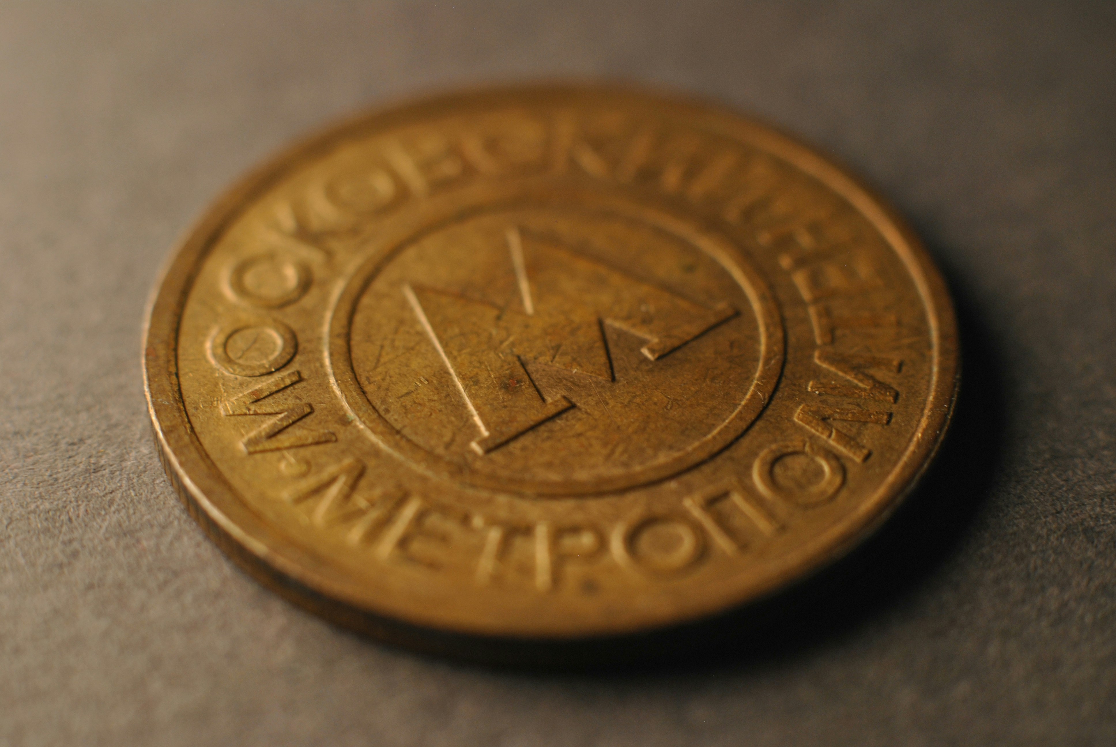 A close up of a coin on a table
