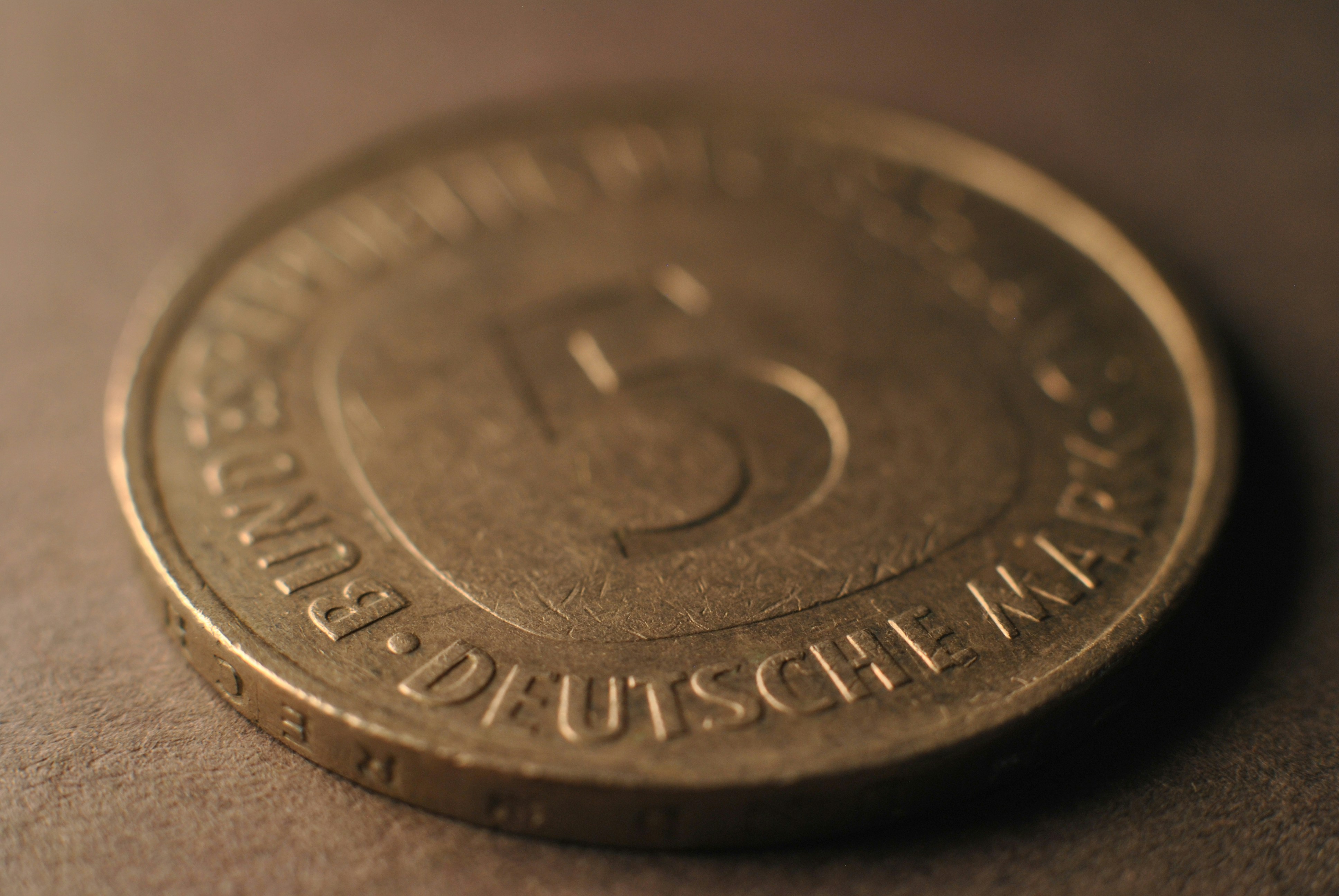 A close up of a coin on a table