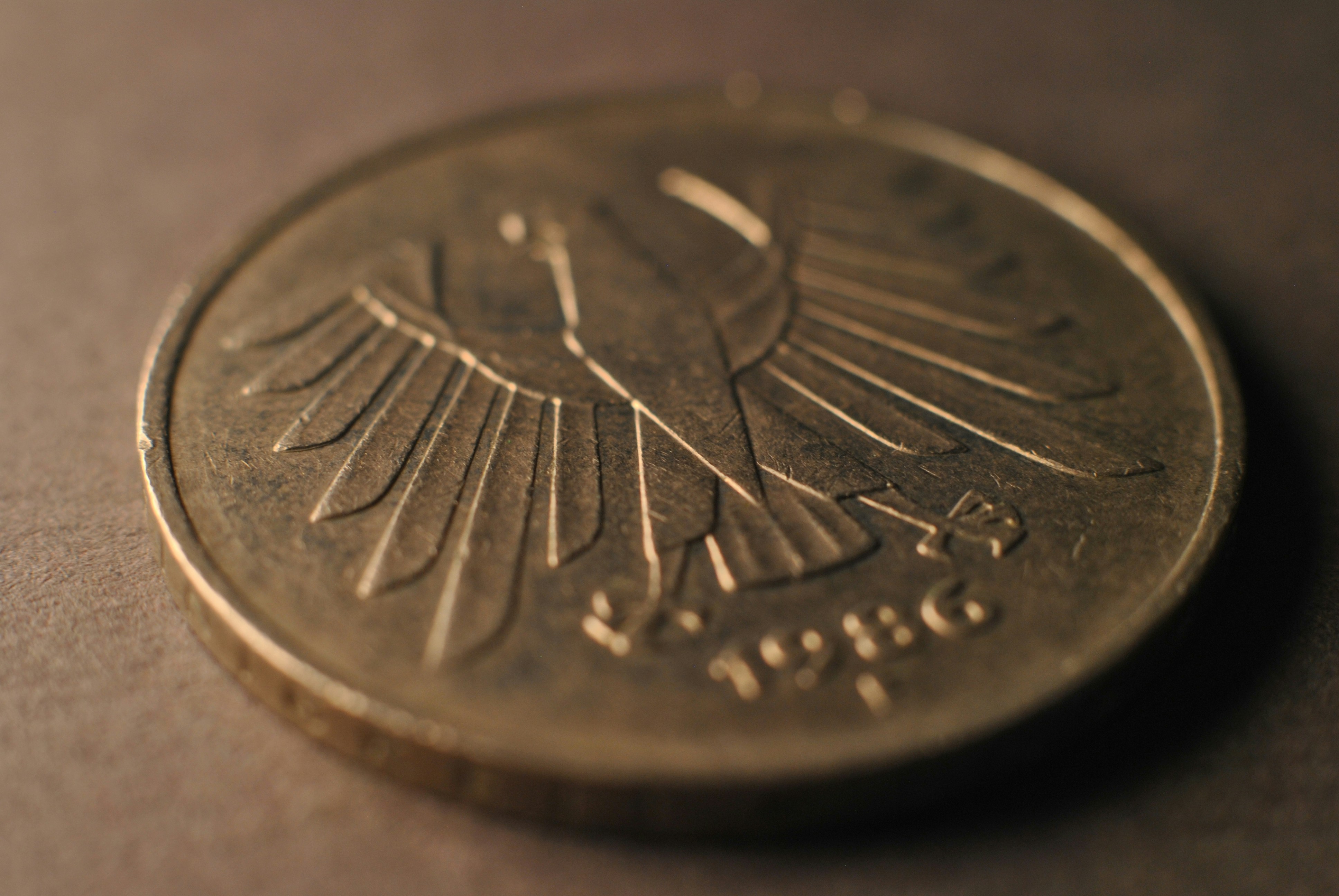 A close up of a coin on a table