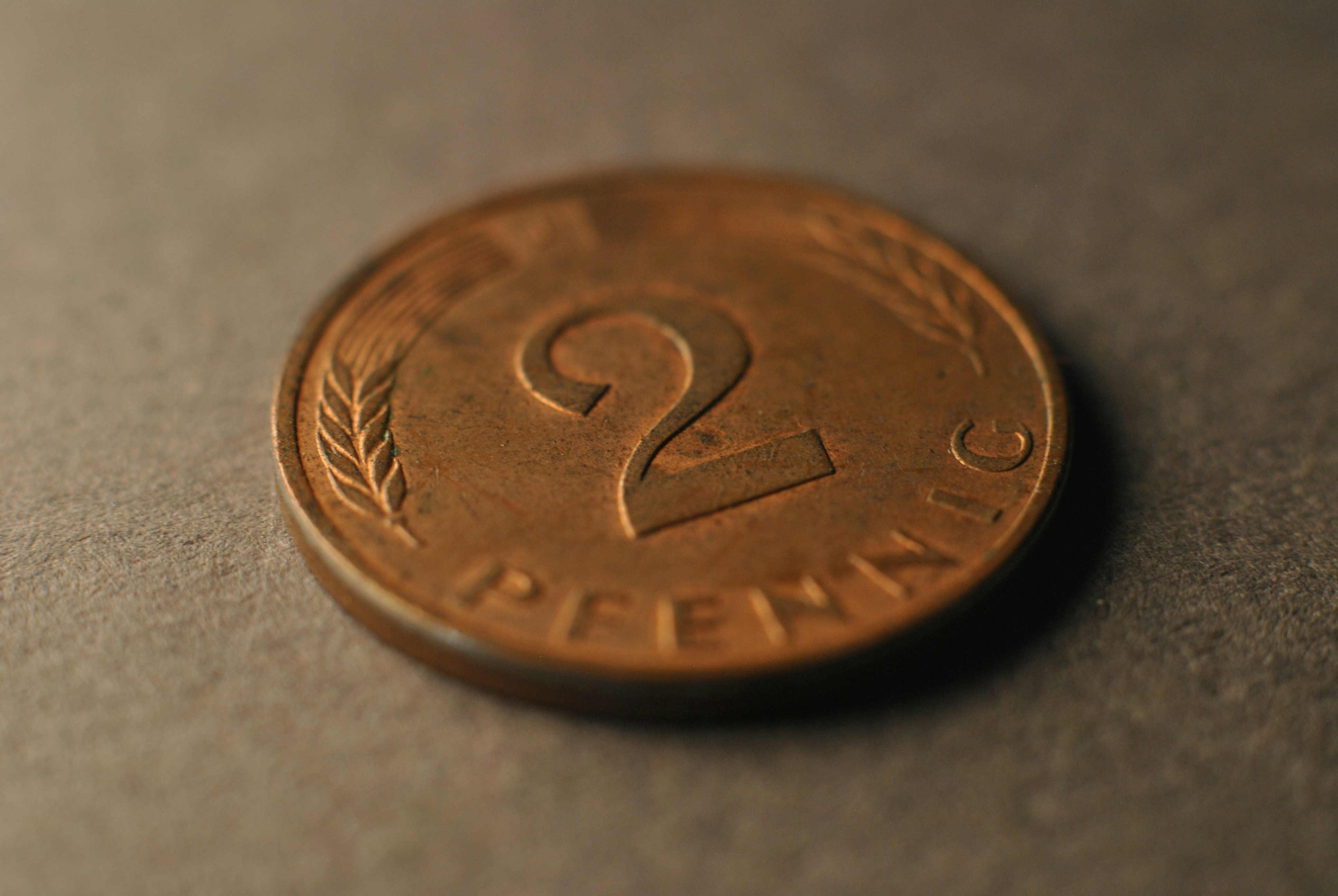 A close up of a coin on a table