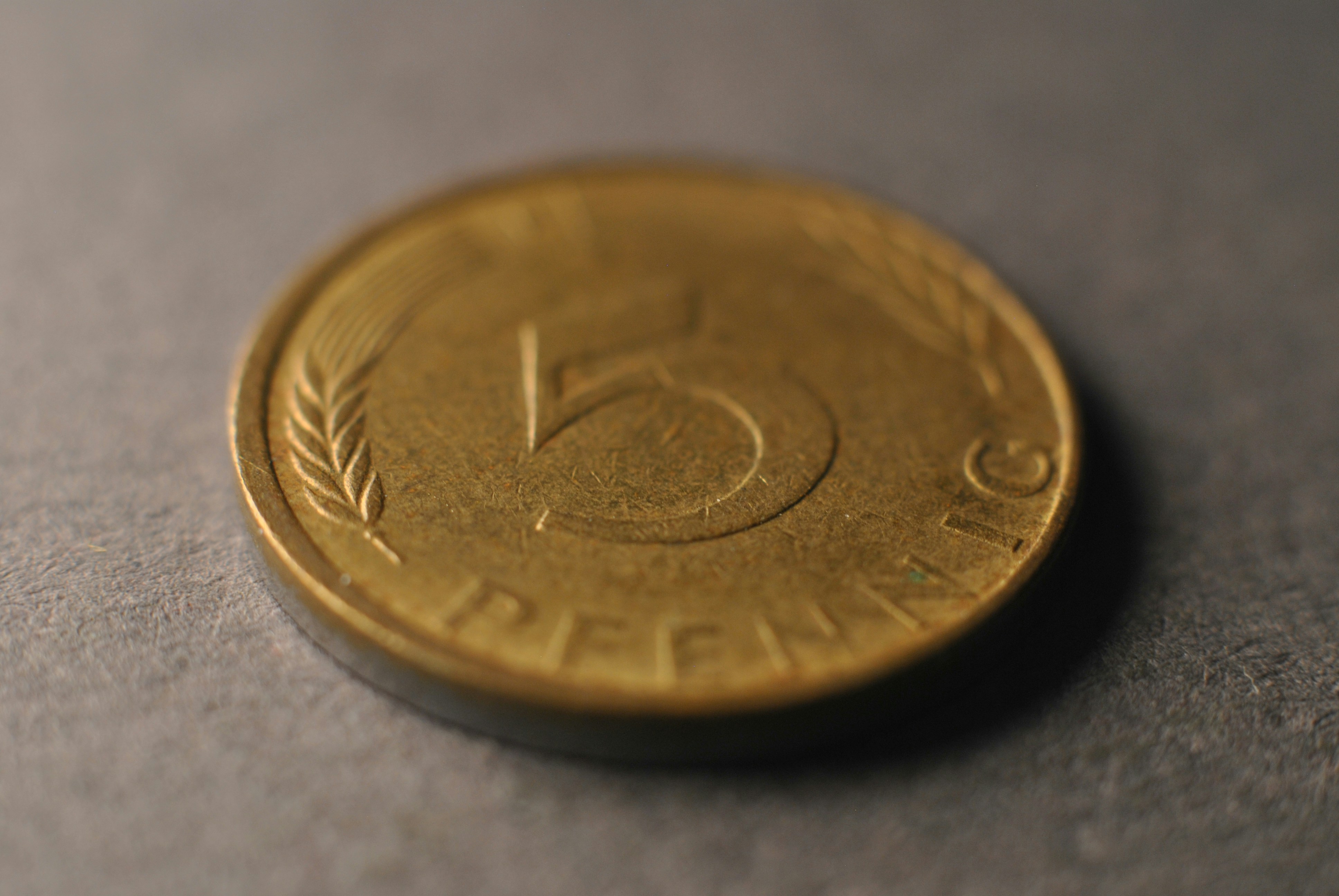 A close up of a coin on a table