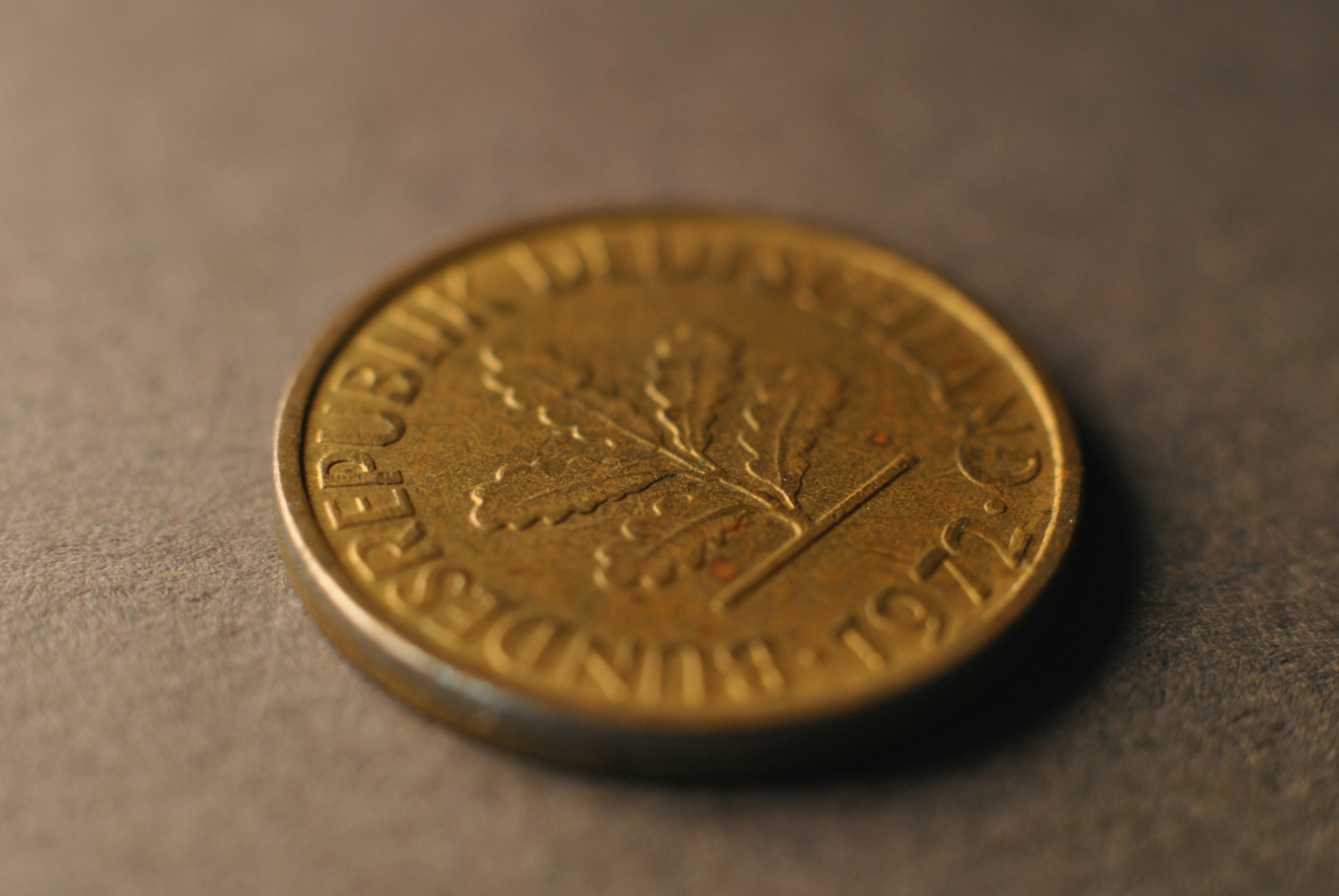 A close up of a coin on a table