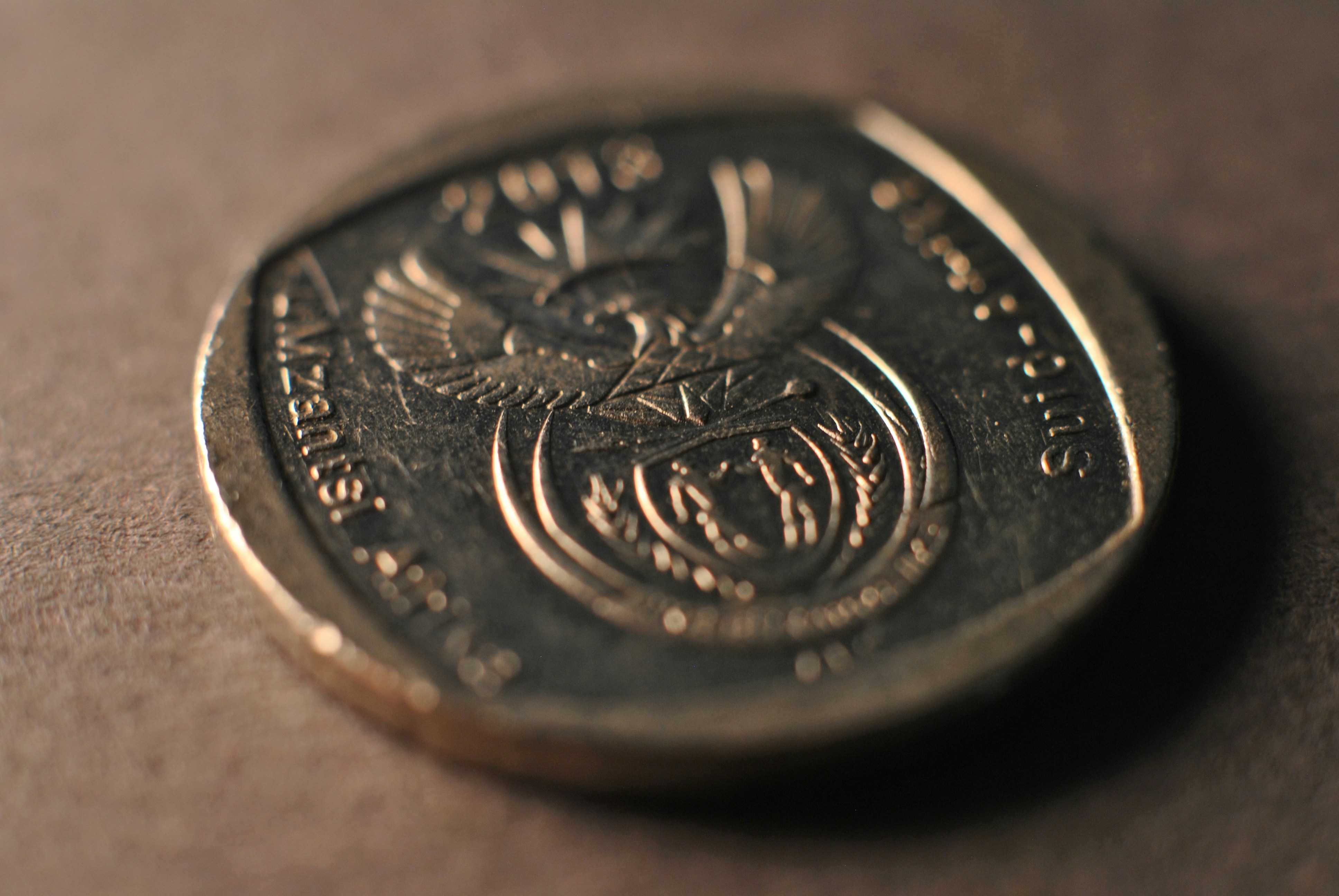 A close up of a coin on a table