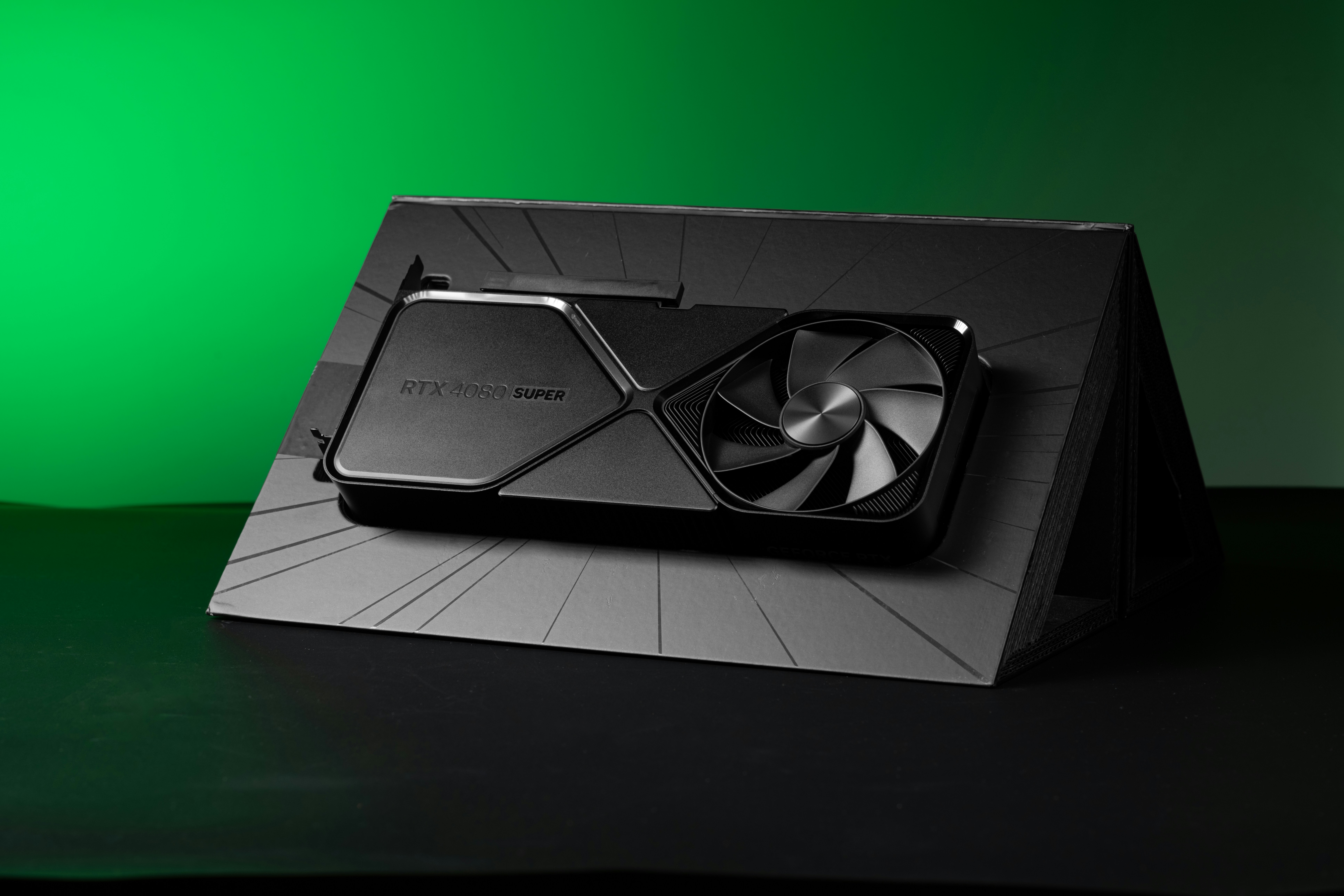 A black box with a fan on top of it