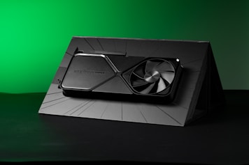 A black box with a fan on top of it