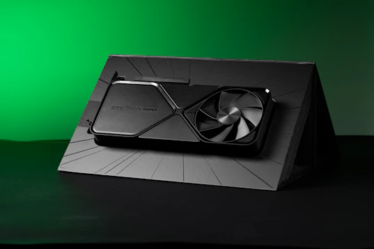 A black box with a fan on top of it
