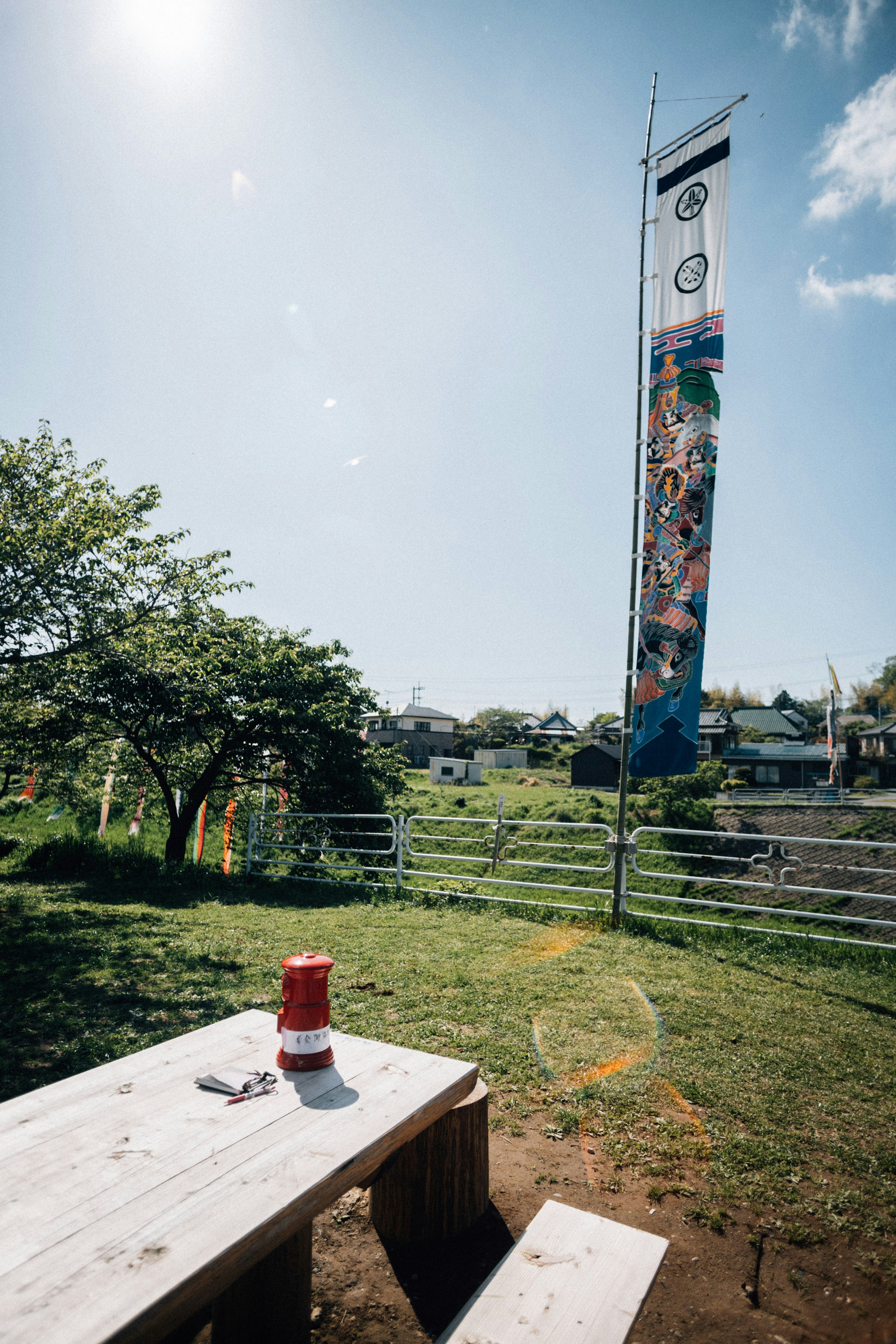 A picnic table with a flag in the background photo Free Japan Image