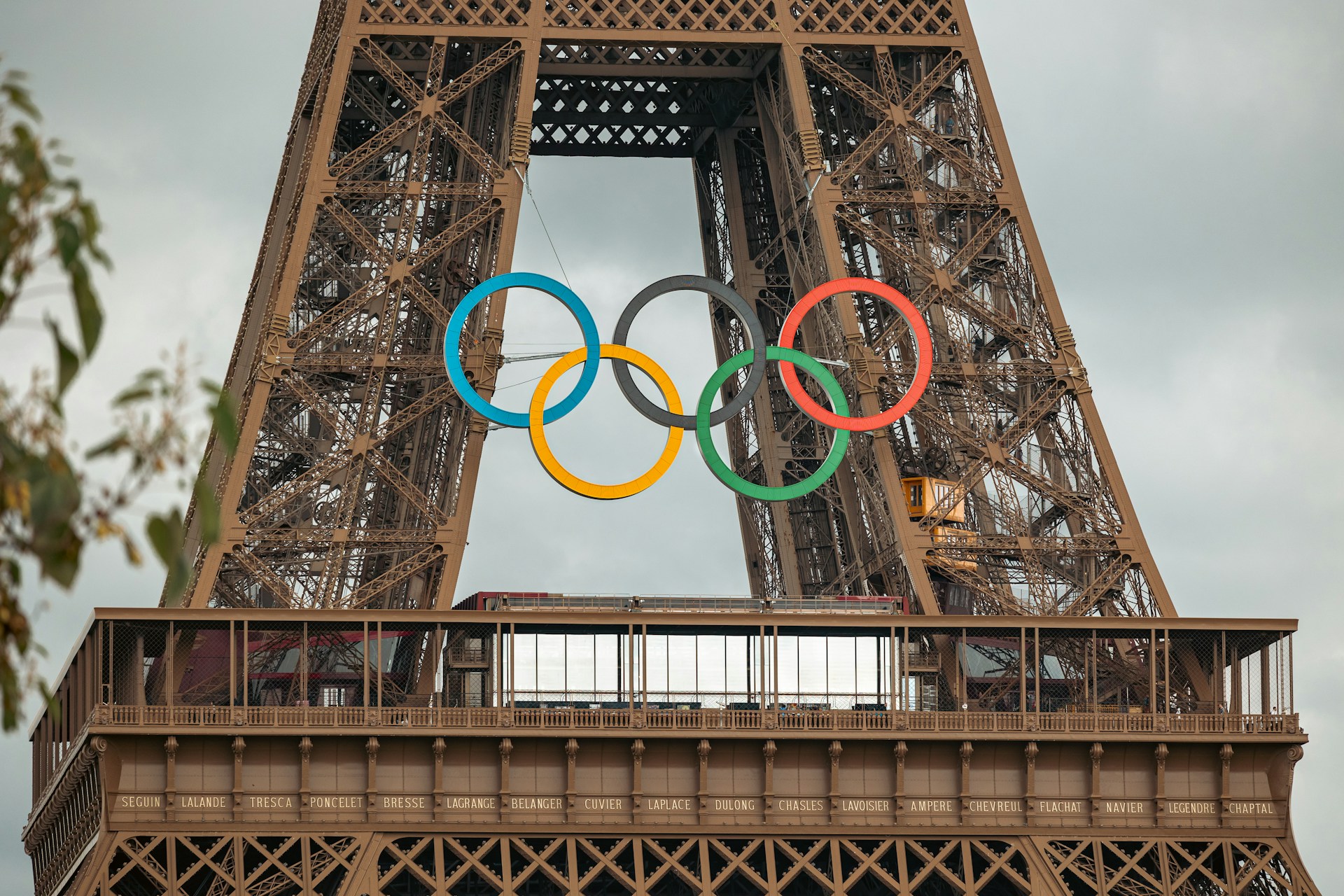 The eiffel tower with the olympic rings on top