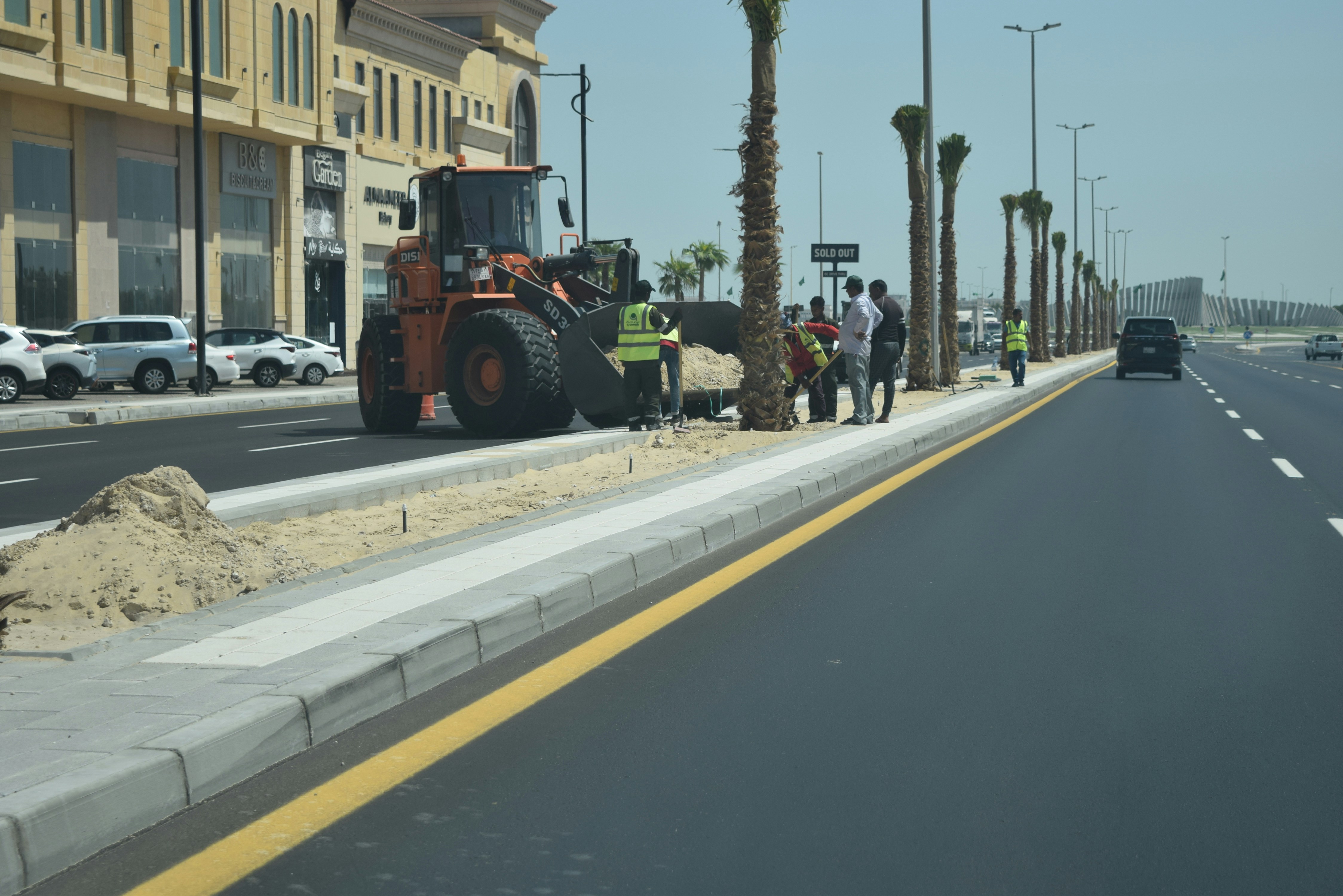 A bulldozer is parked on the side of the road