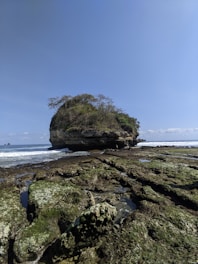 A small island in the middle of the ocean