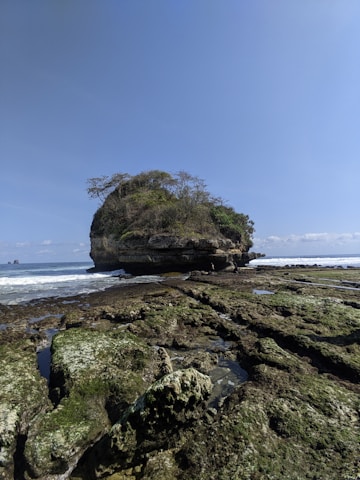 A small island in the middle of the ocean