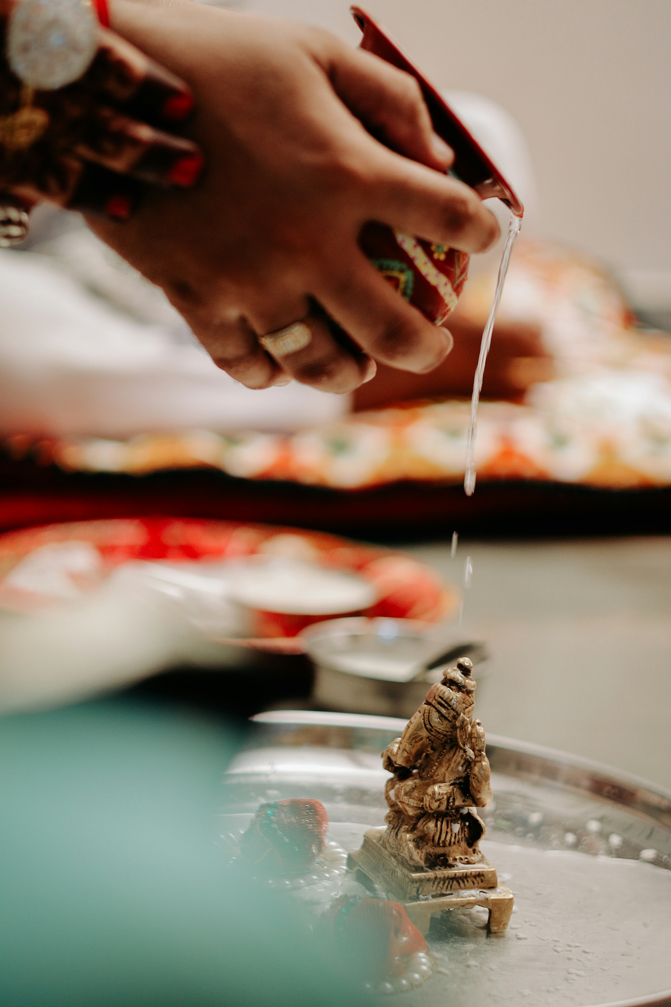 A person is serving food to another person