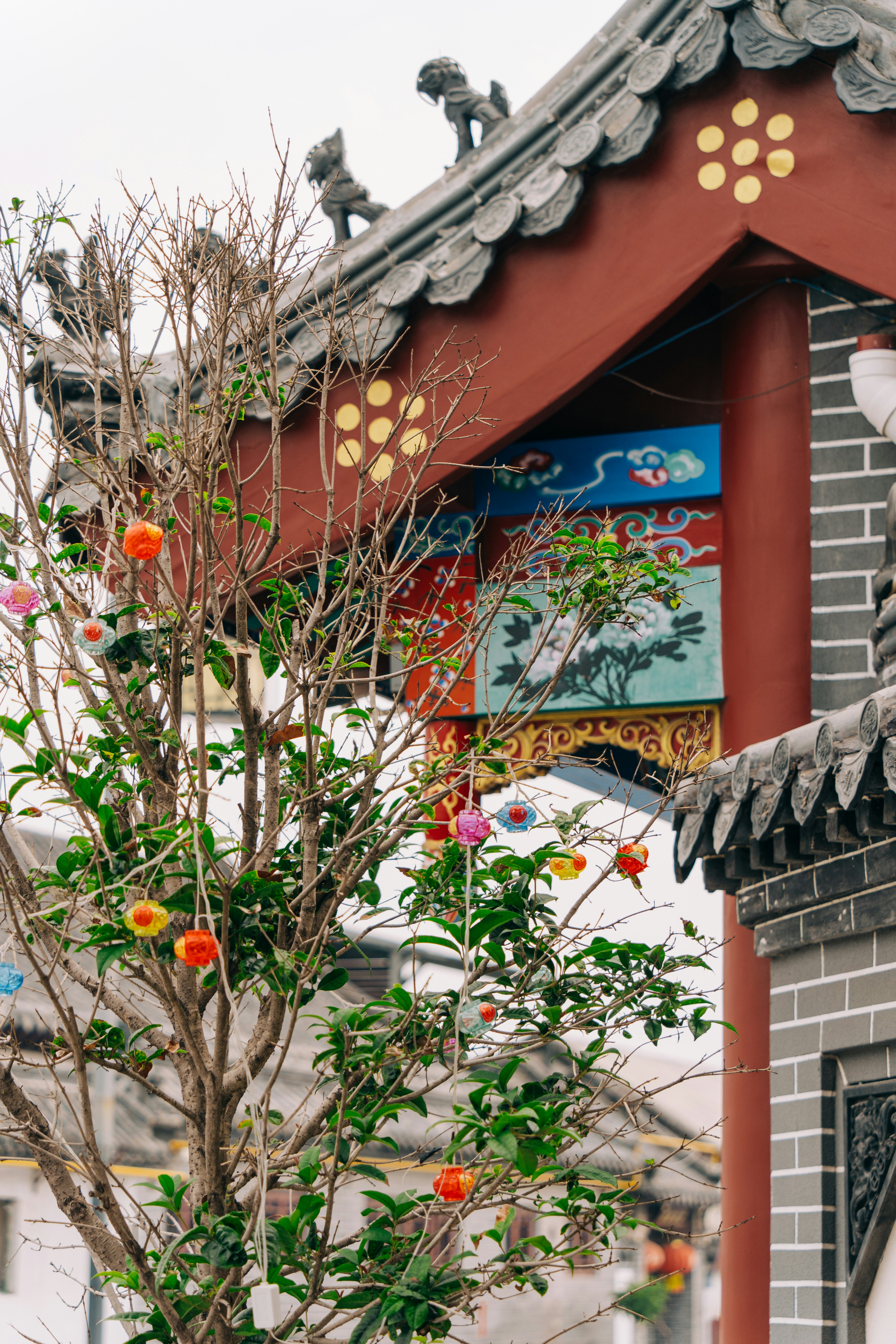 A building with a tree in front of it