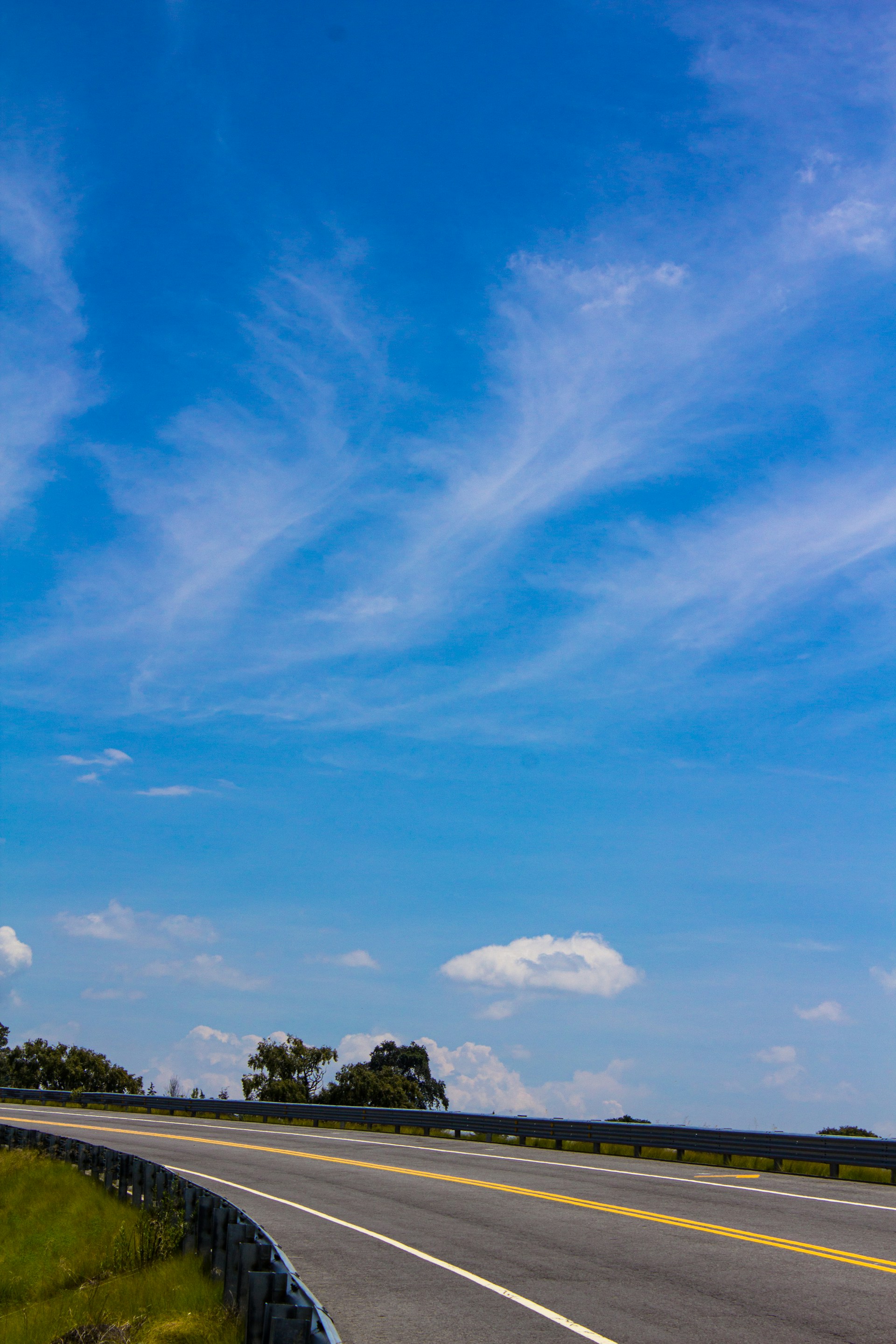 A street sign on the side of a road
