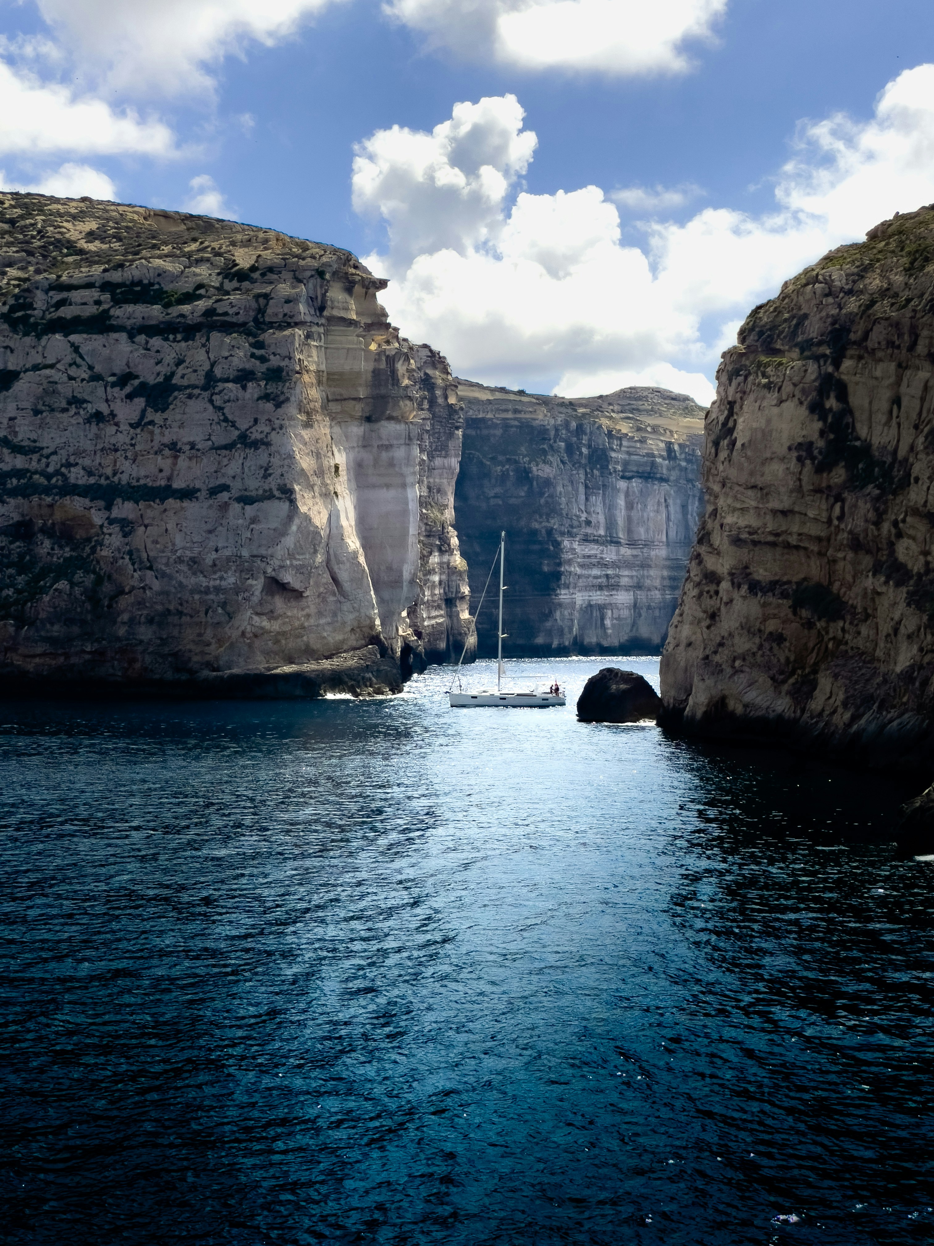 A large body of water surrounded by mountains