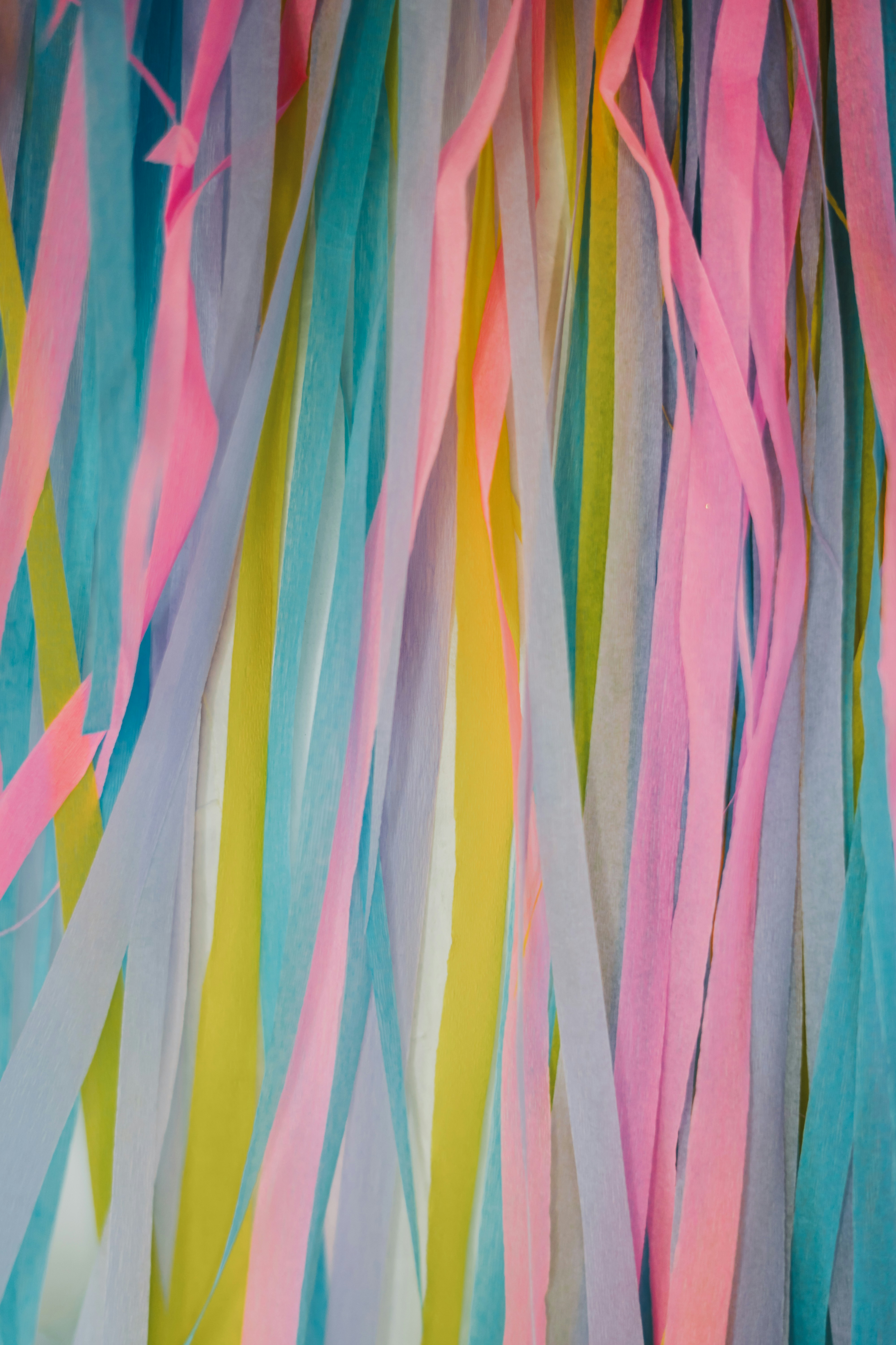 A bunch of streamers of different colors and sizes