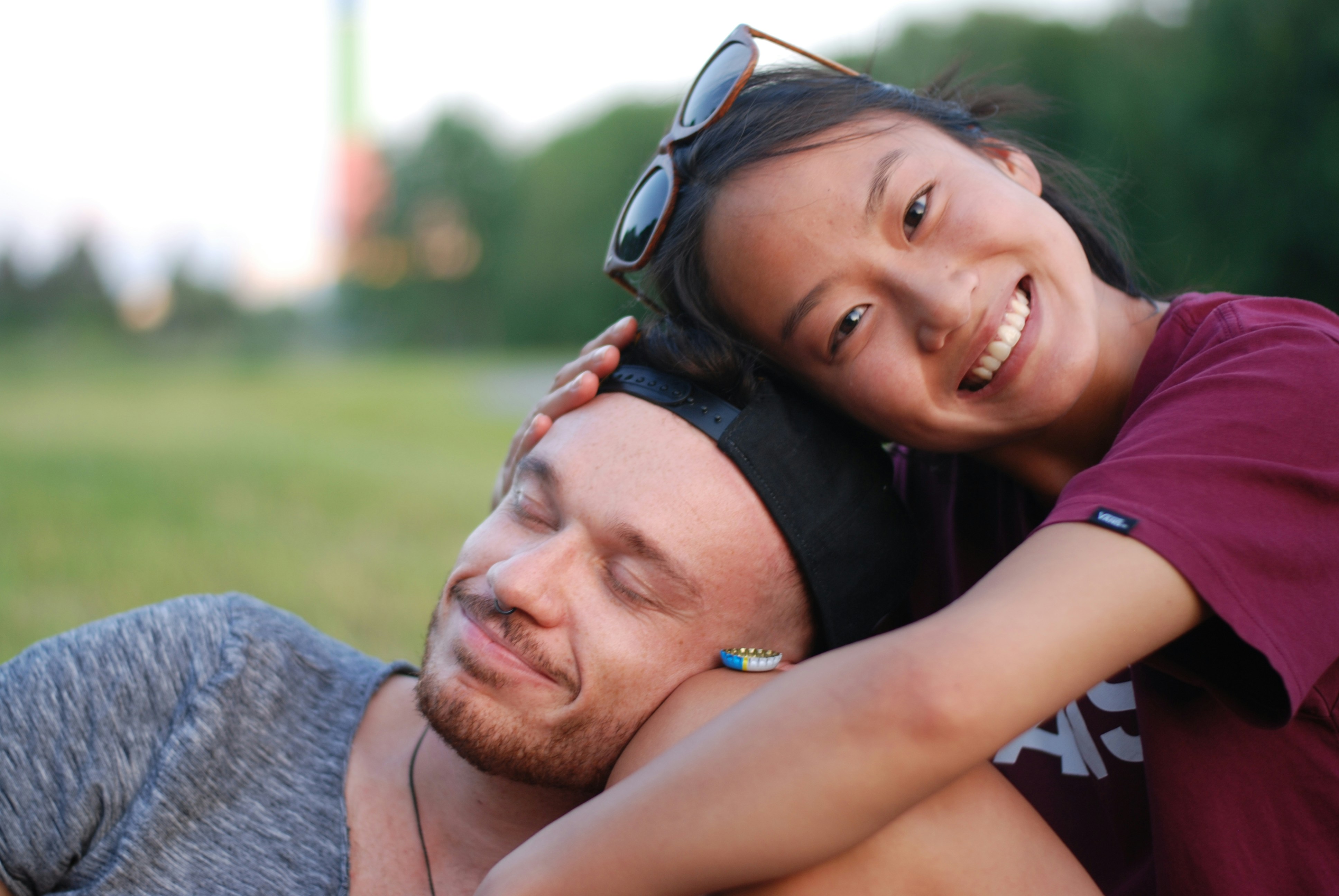 A man holding a woman on his back