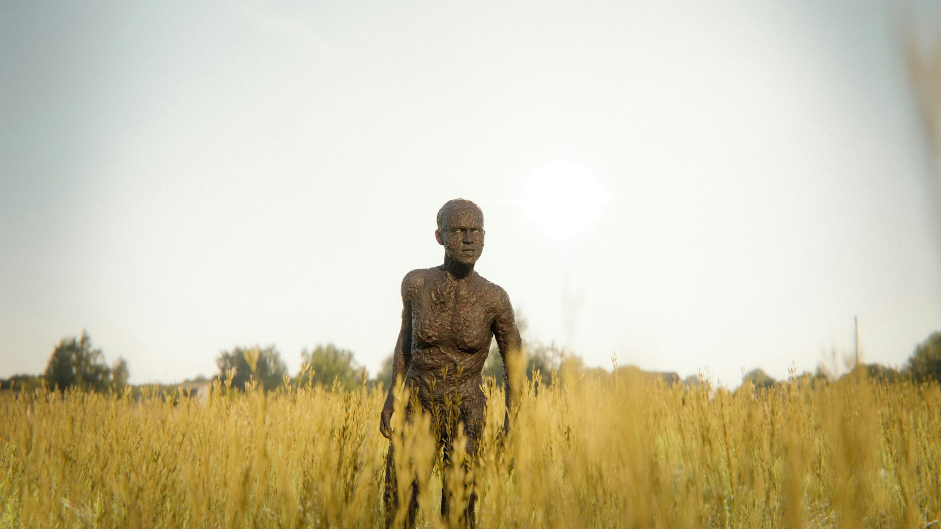 A man standing in a field of tall grass
