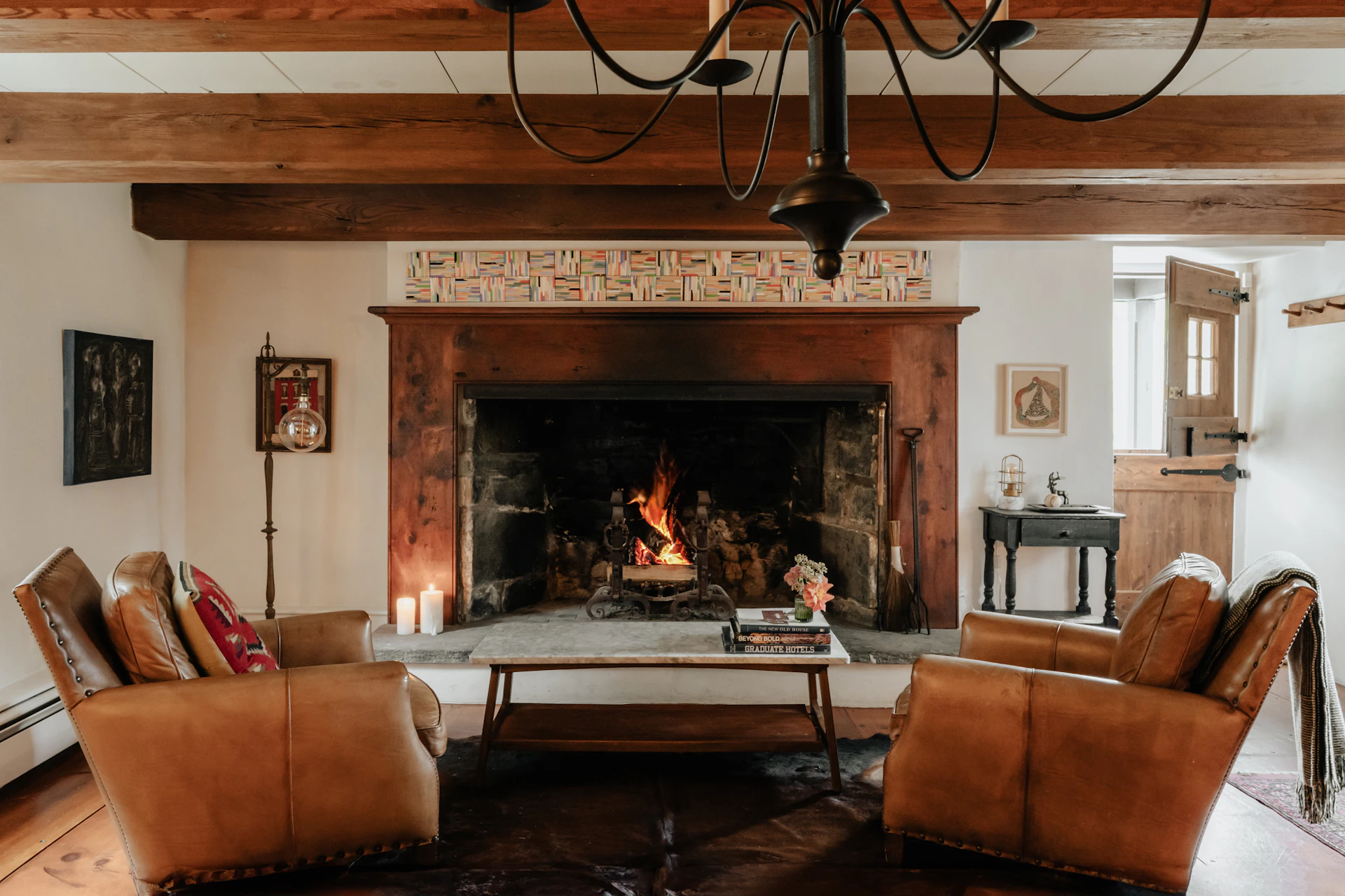 A living room filled with furniture and a fire place