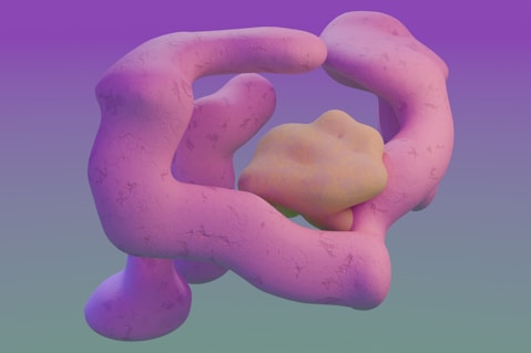 A close up of a pink object on a purple background