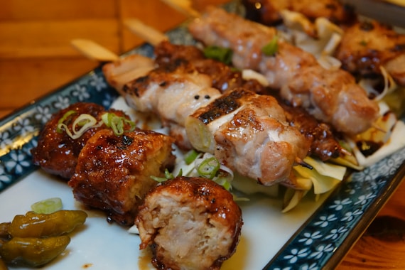 A close up of a plate of food with meat