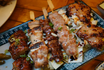 Grilled yakitori skewers, typical of a Japanese yakitori alley stall
