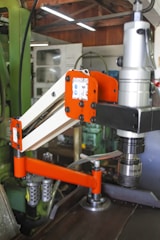 A machine that is working on a piece of metal