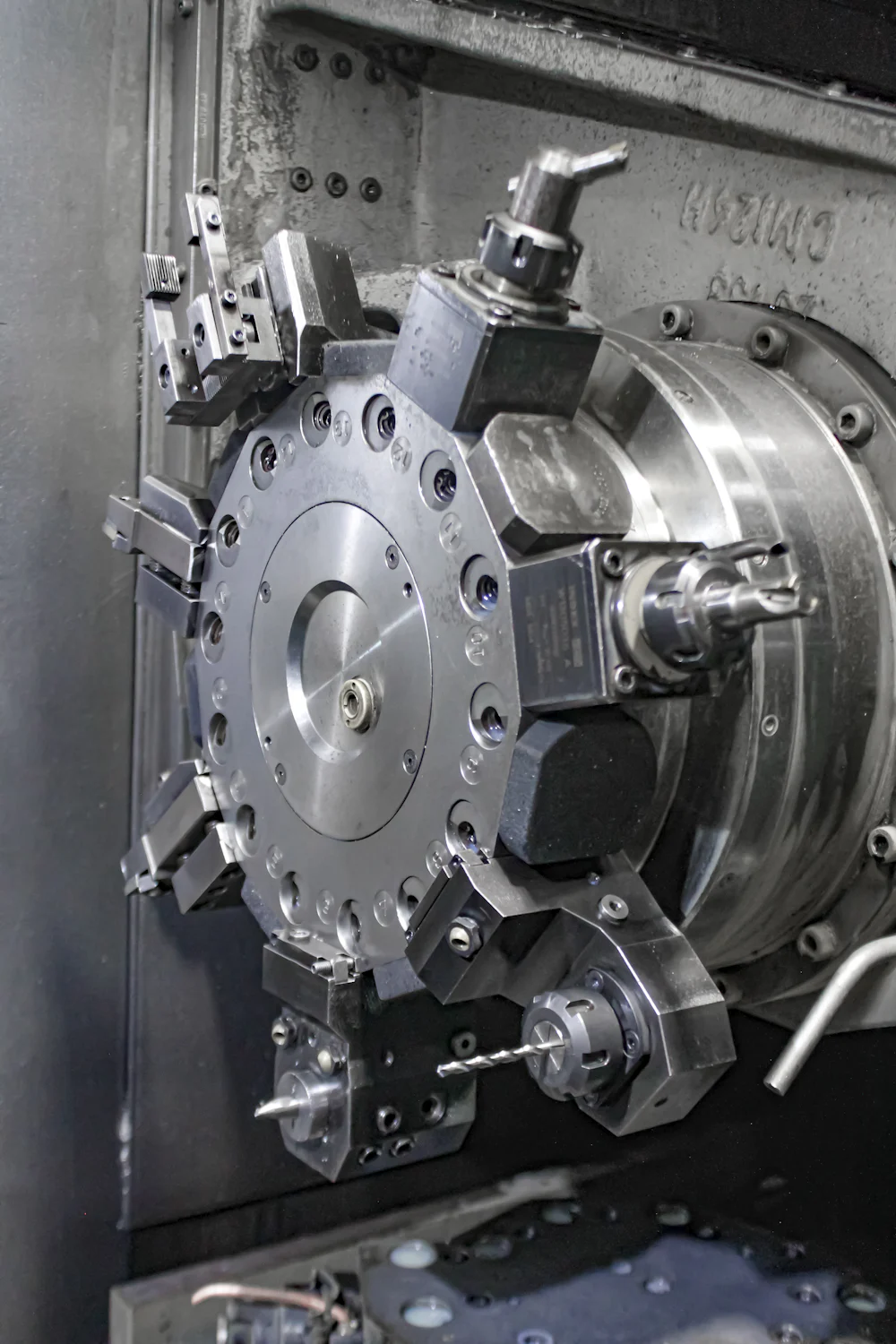 Turret of a CNC lathe loaded with cutting tools