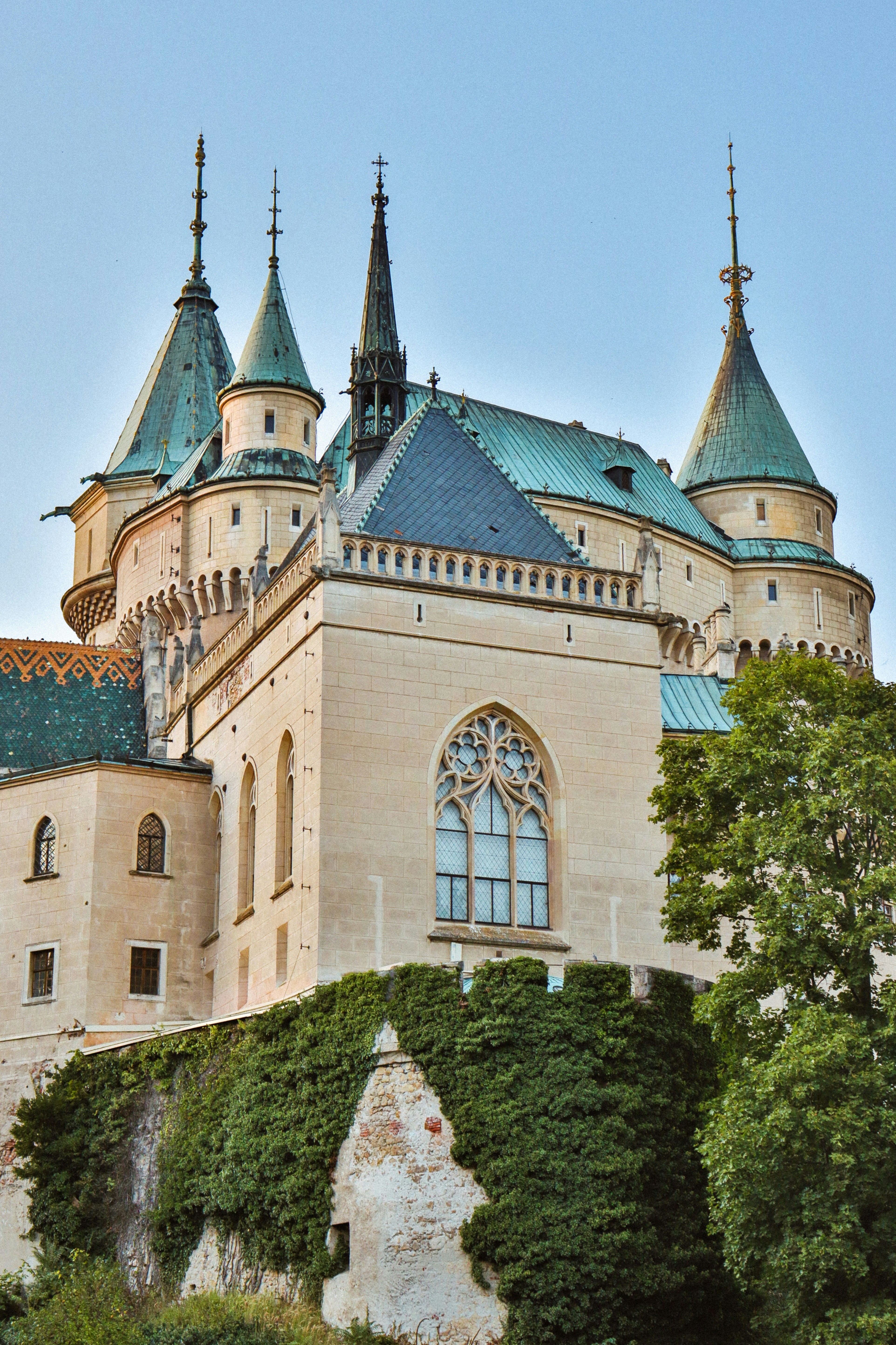 A large castle with a clock tower on top of it