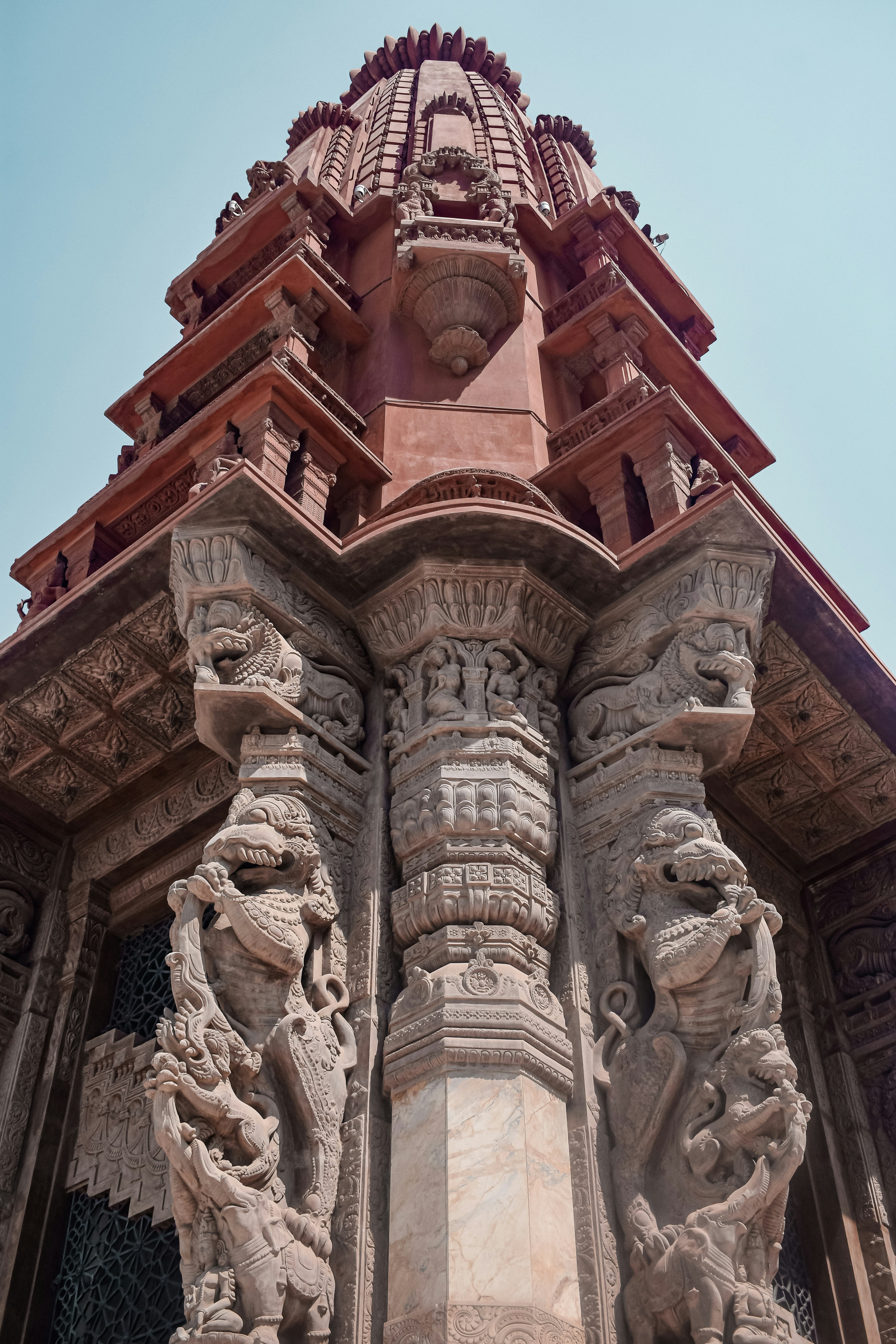 A tall tower with a clock on top of it