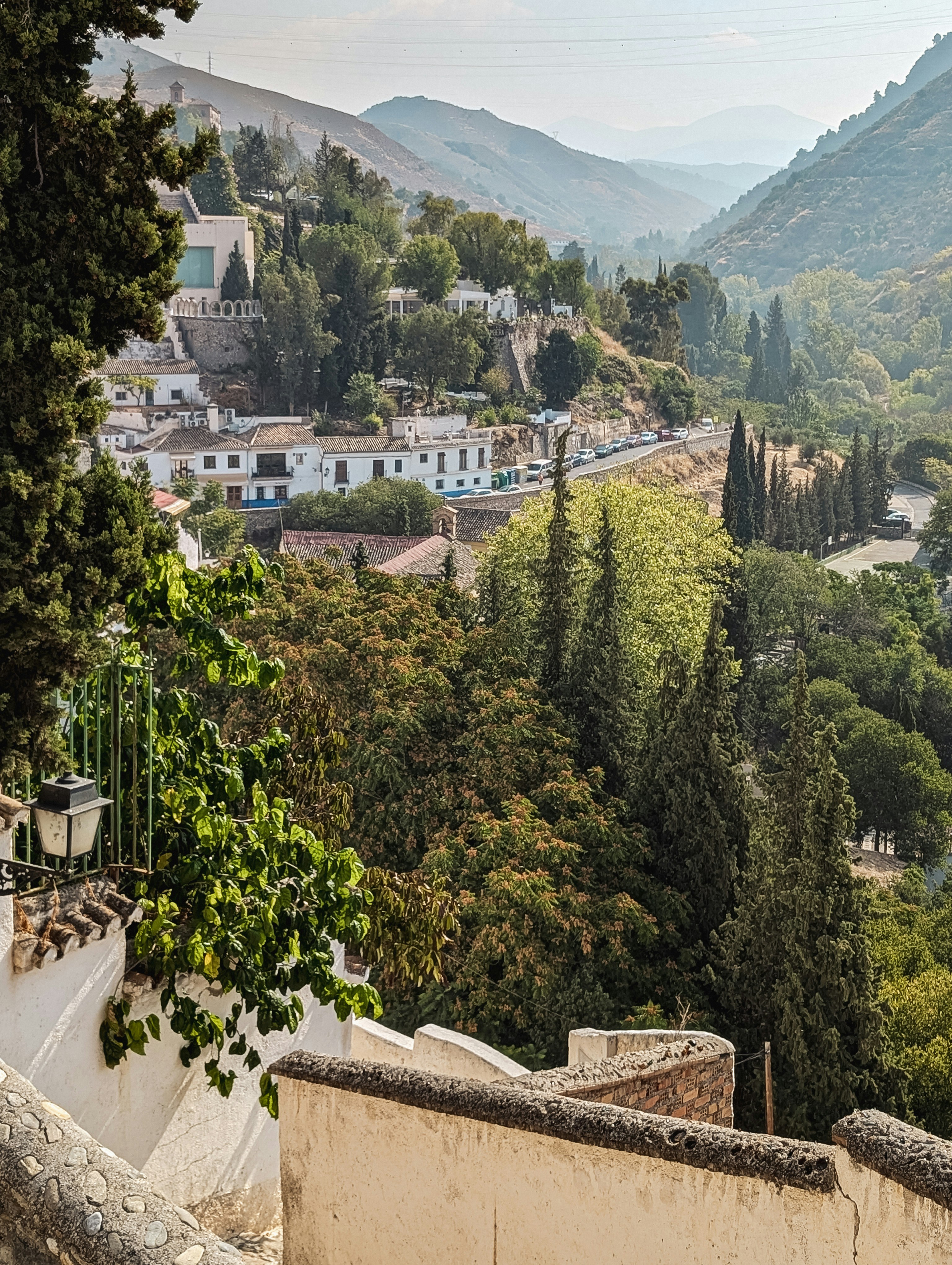 A scenic view of a town in the mountains