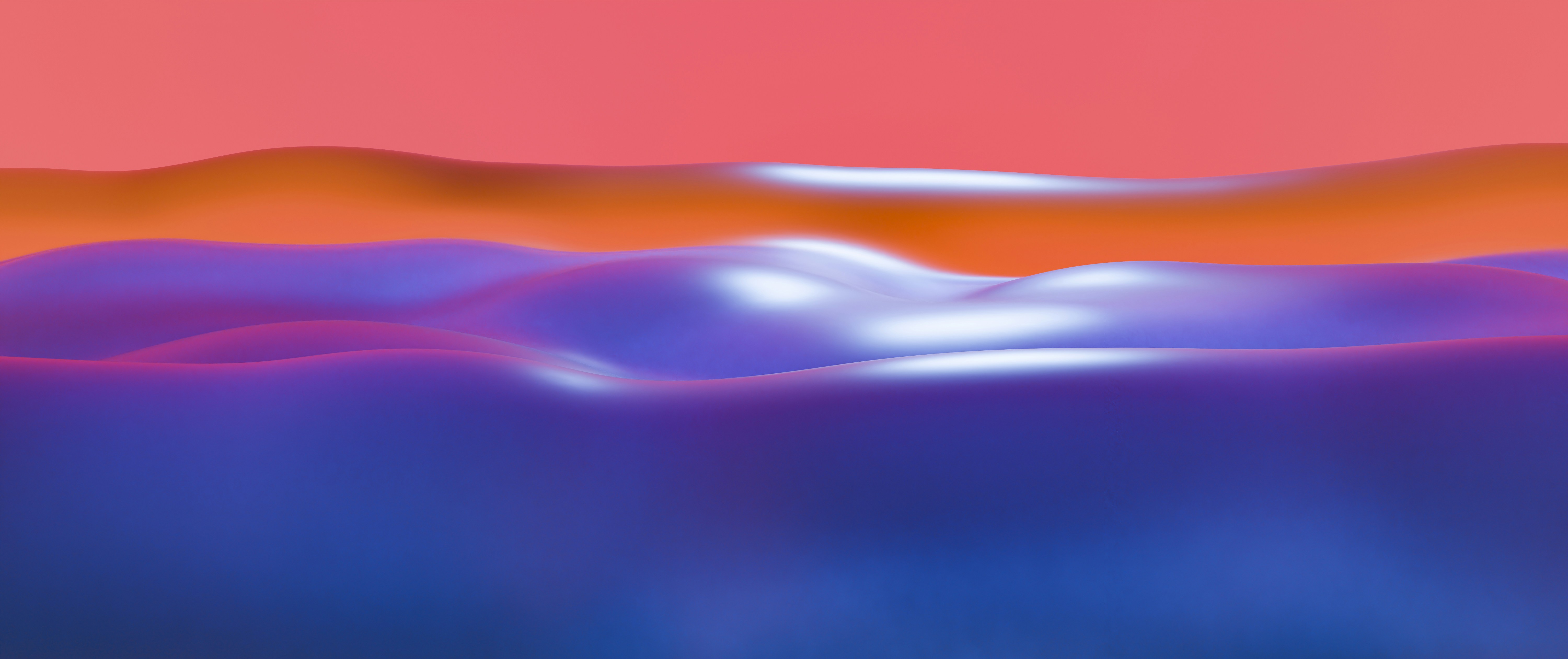 A blurry image of a sunset over a body of water