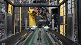 A machine is moving a conveyor belt in a factory