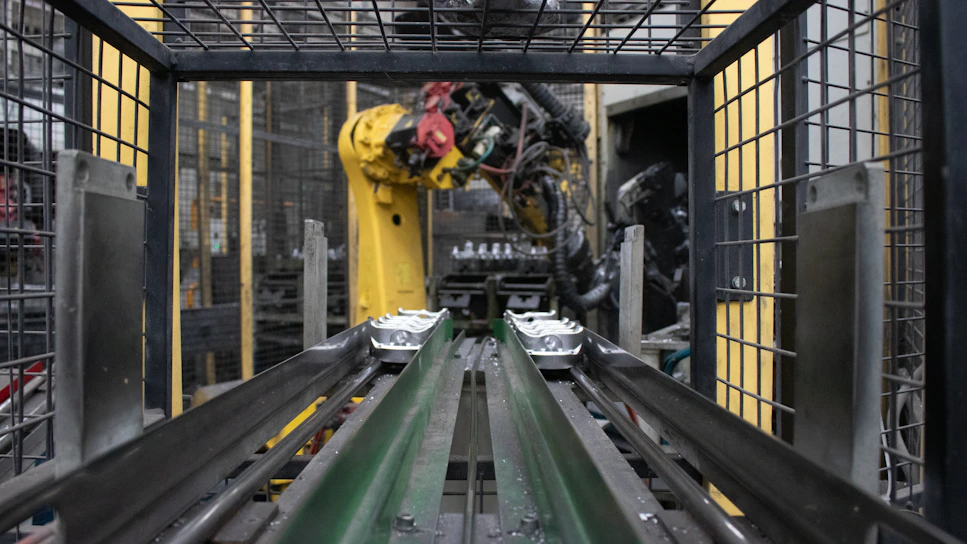 A machine is moving a conveyor belt in a factory