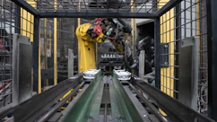 A machine is moving a conveyor belt in a factory
