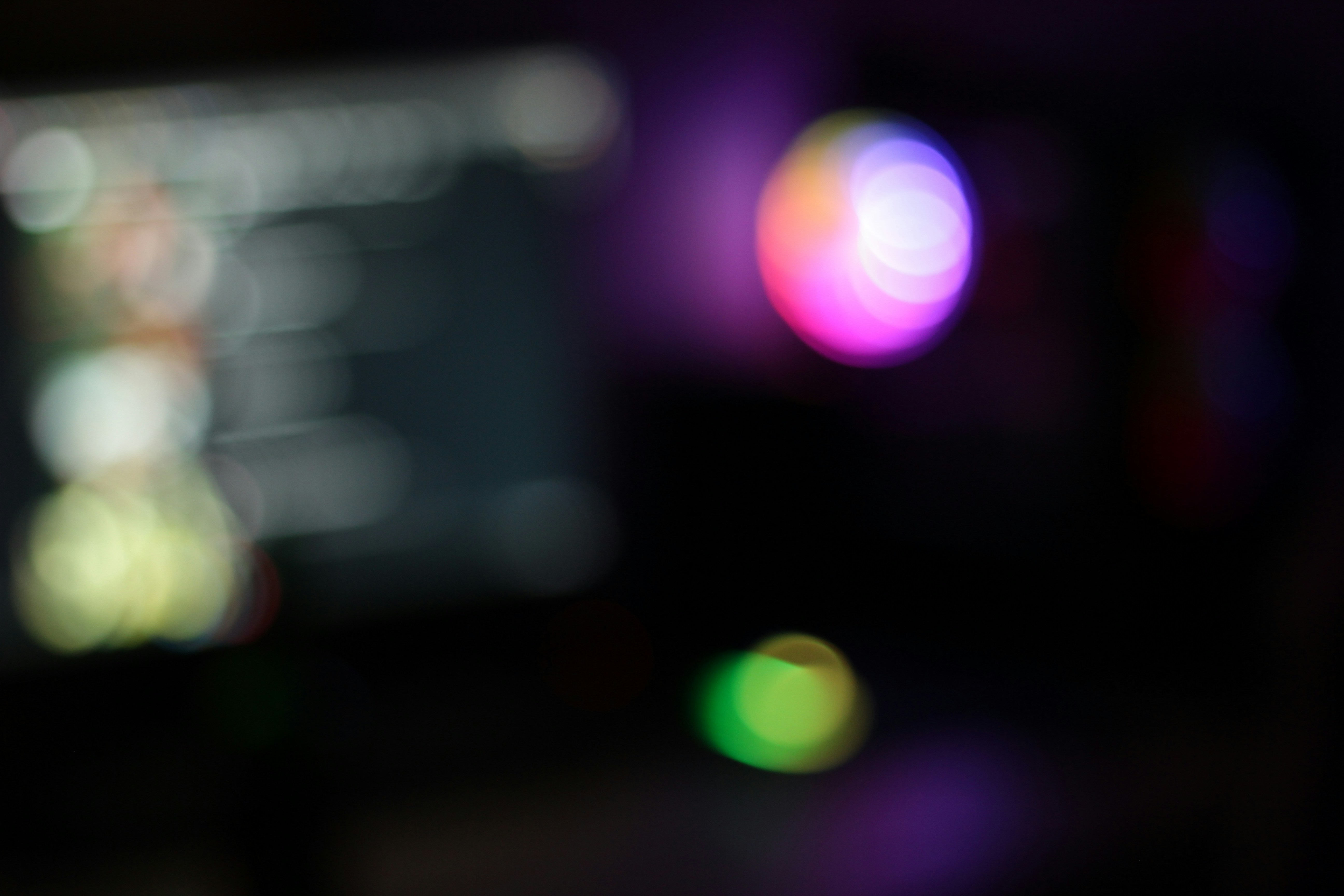 A blurry photo of a cell phone with a blurry background