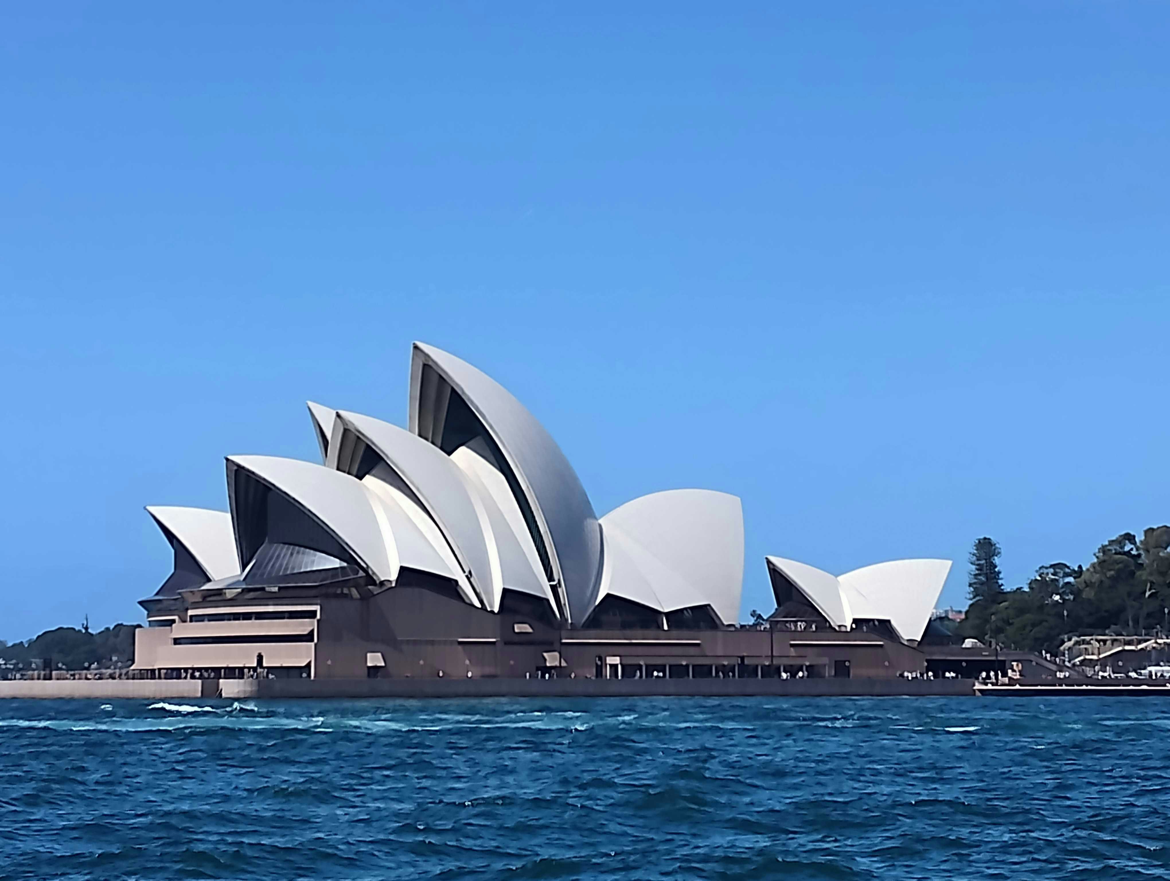 A large building that is sitting in the water