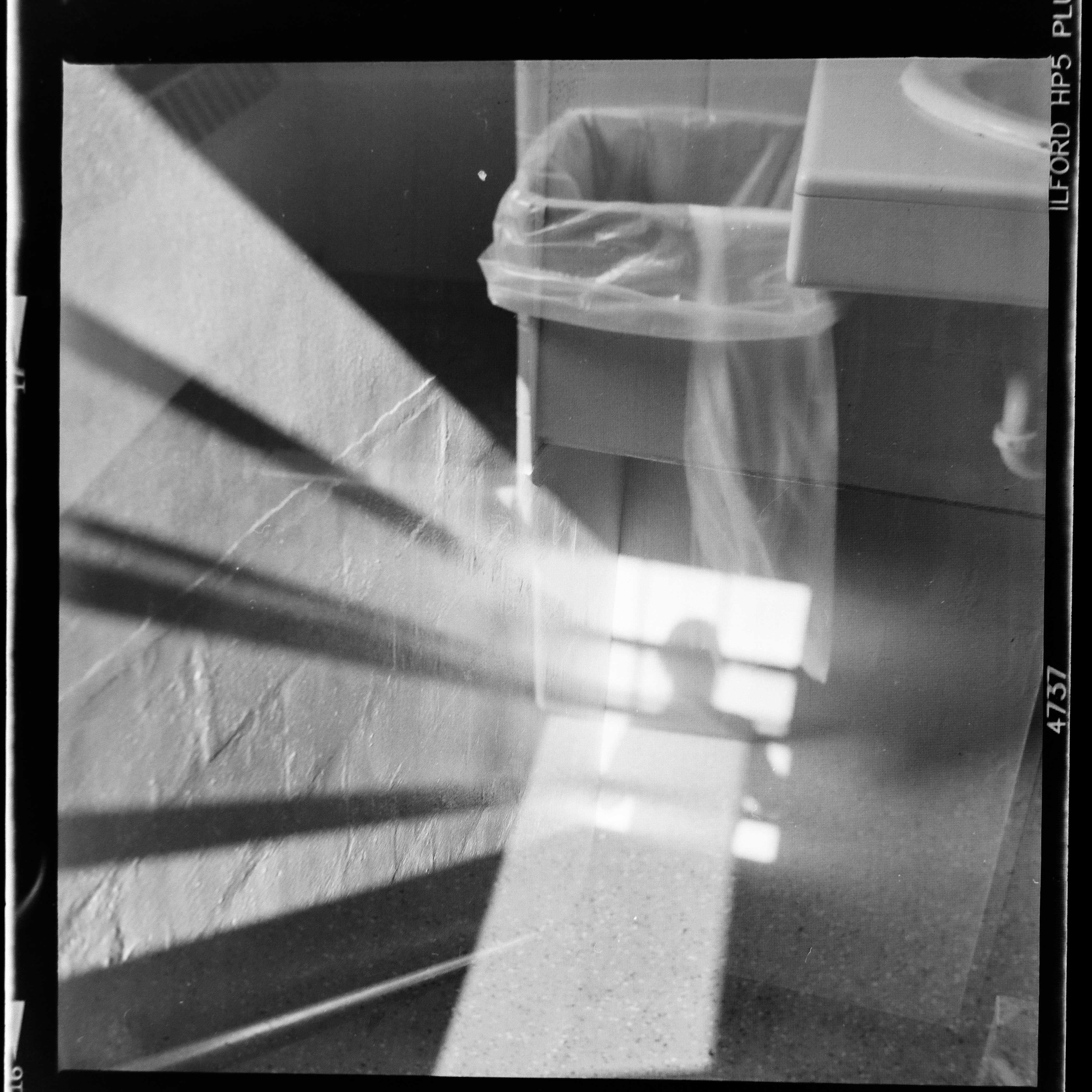 A black and white photo of a bathroom photo – Free Film photography ...