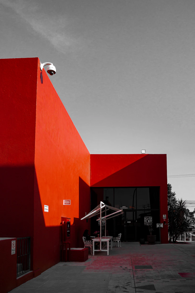 A black and white photo of a red building