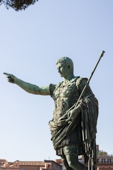 A statue of a man holding a spear