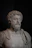 A marble bust of a man with a beard