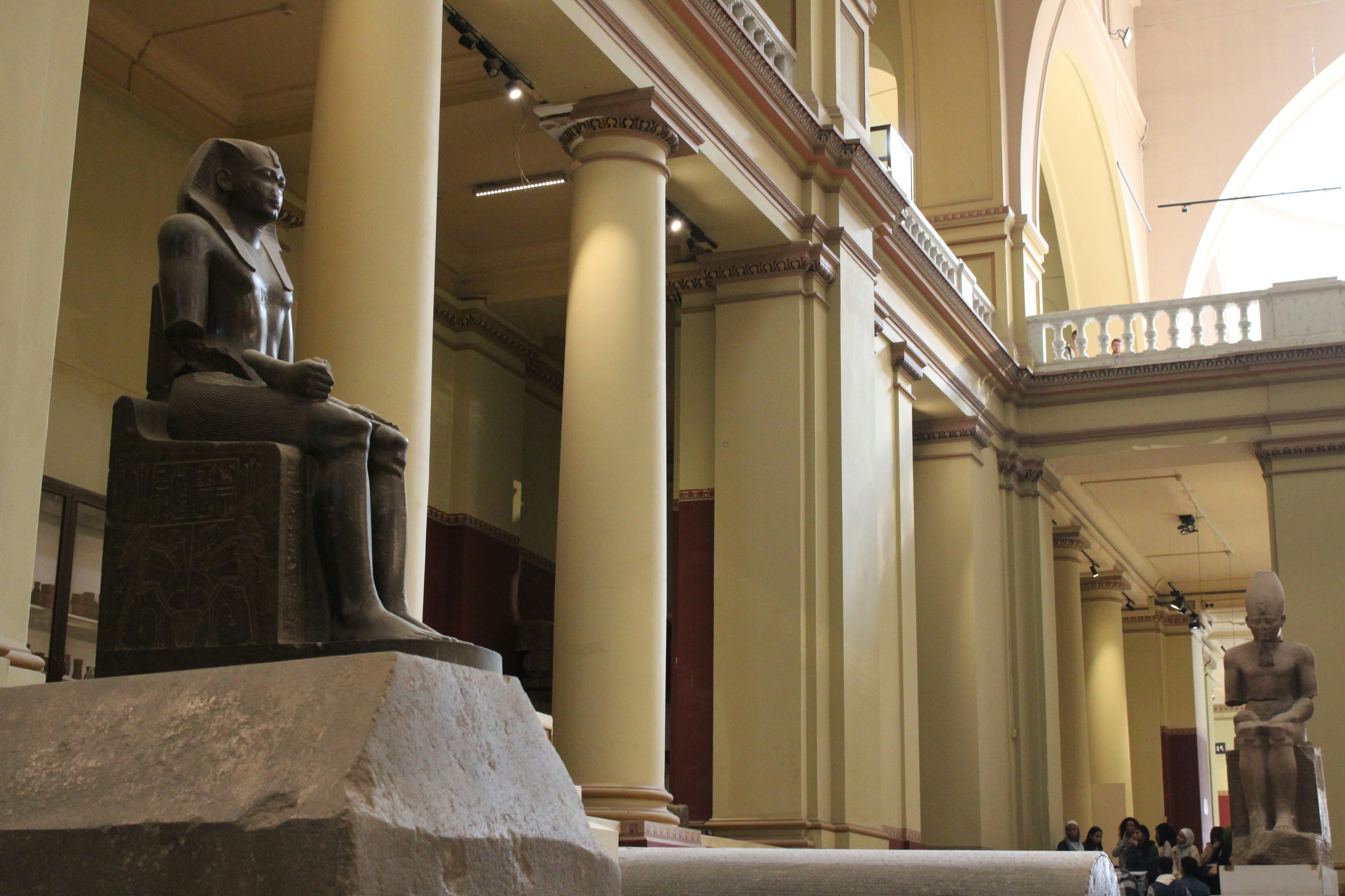 A statue of a pharaoh in a museum
