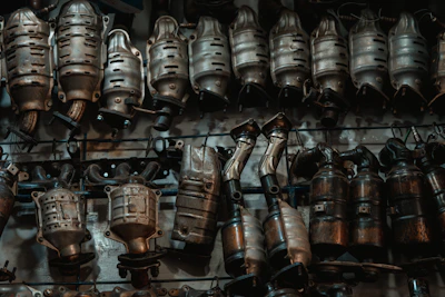 A bunch of metal objects hanging on a wall