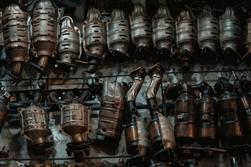 A bunch of metal objects hanging on a wall