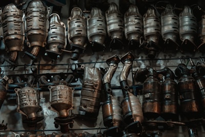 A bunch of metal objects hanging on a wall